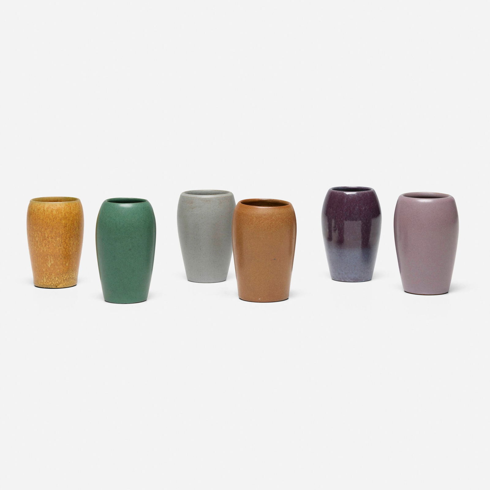 Marblehead Pottery, Collection of six vases: Marblehead Pottery Collection of six vases USA, c. 1920glazed earthenware 3.5 h x 2.5 dia in (9 x 6 cm) 3.25 h x 2 dia in (8 x 5 cm) Impressed or glazed over manufacturer's mark to undersid