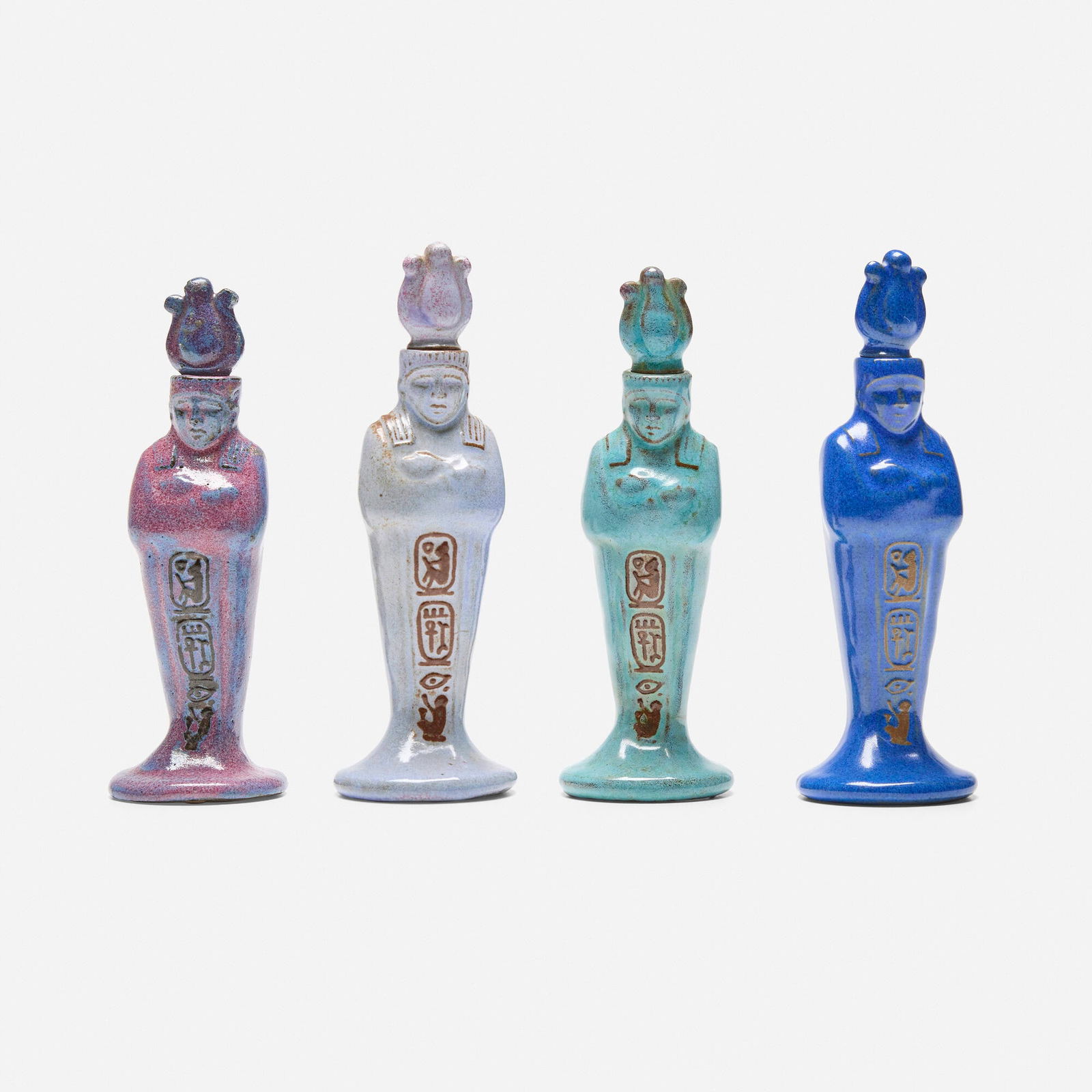 Marblehead Pottery, King Tut perfume bottles, set of four: Marblehead Pottery King Tut perfume bottles, set of four USA, c. 1926-30glazed earthenware 5.25 h x 1.75 dia in (13 x 4 cm) The mold for this model was created using an original bottle from Ki