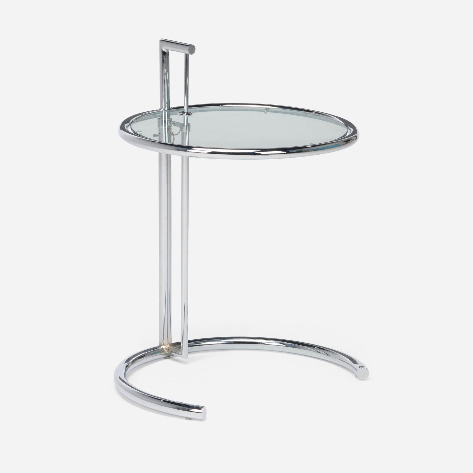 After Eileen Gray, Adjustable occasional table: After Eileen Gray Adjustable occasional table c. 1995chrome-plated tubular steel, glass 24.75 h x 19.5 dia in (63 x 50 cm) This work will ship from Lambertville, New Jersey.