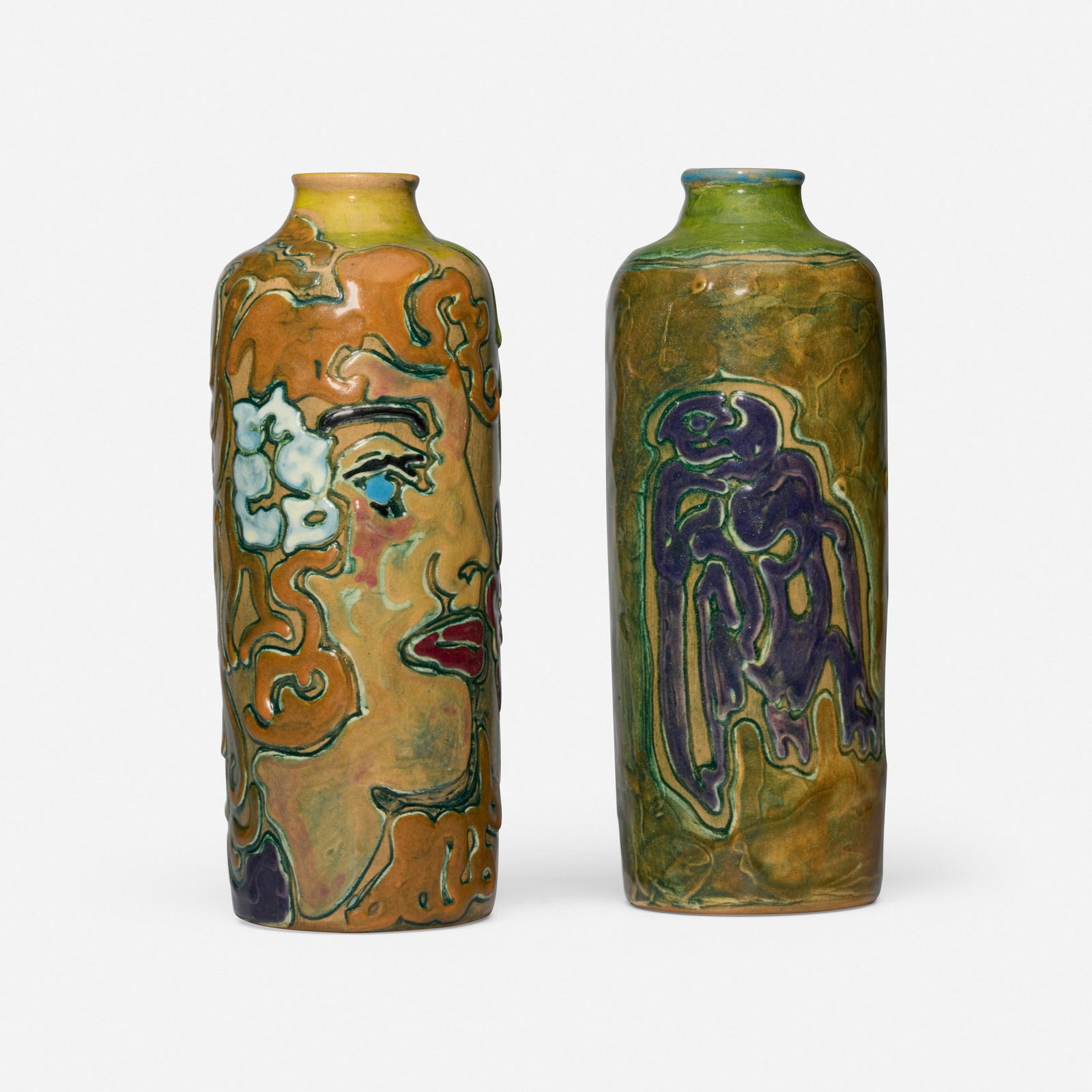 Shearwater Pottery, Vases, set of two: Shearwater Pottery Vases, set of two USA, 1991glazed and carved earthenware 8 h x 3 dia in (20 x 8 cm) 7.75 h x 3 dia in (20 x 8 cm) Vases variously feature a blonde female portrait and a s