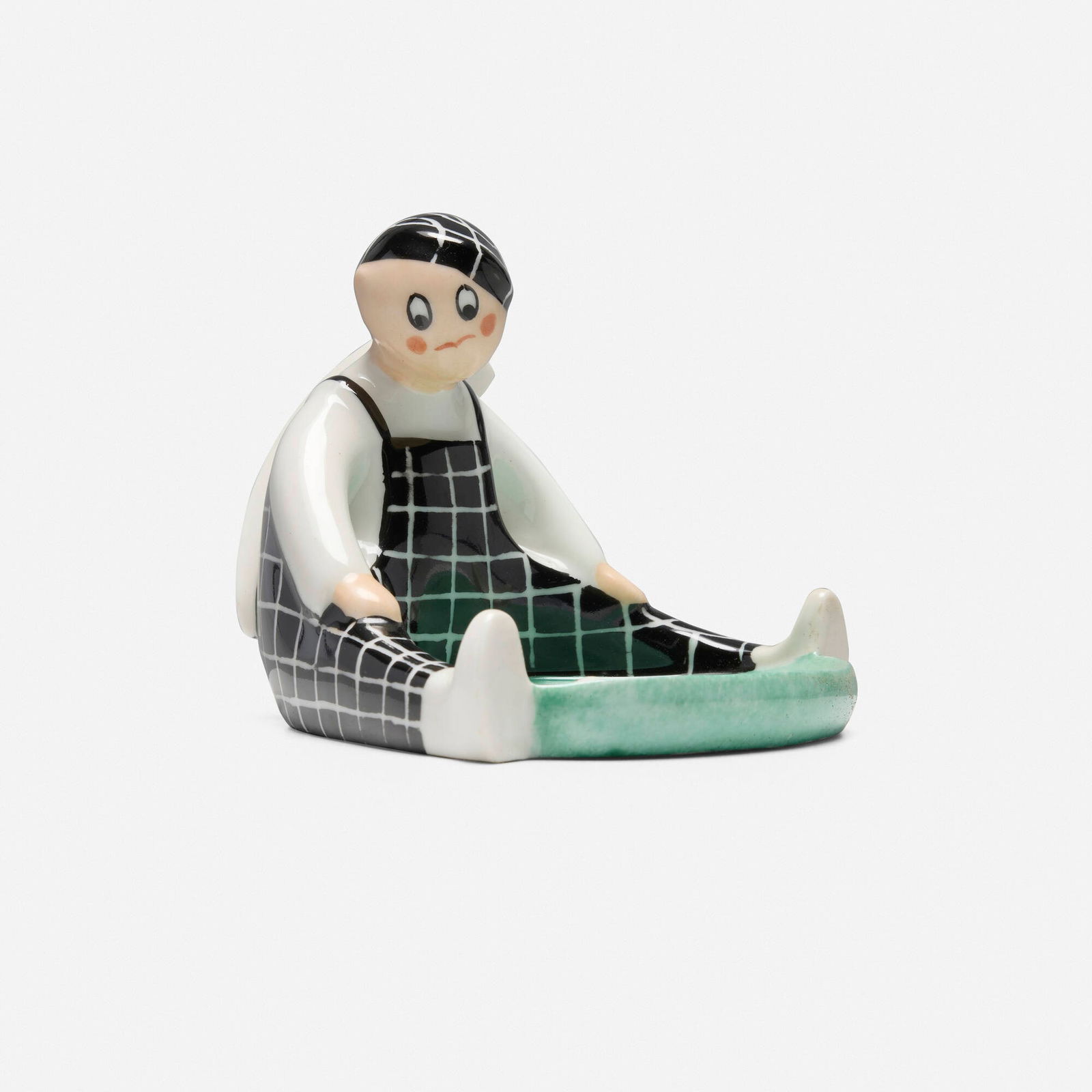 Robj, Vide-poche with seated golfer: Robj Vide-poche with seated golfer France, c. 1930glazed porcelain 4 h x 5 w x 5 d in (10 x 13 x 13 cm) Stamped manufacturer's mark to underside 'Robj Paris Made in France'.