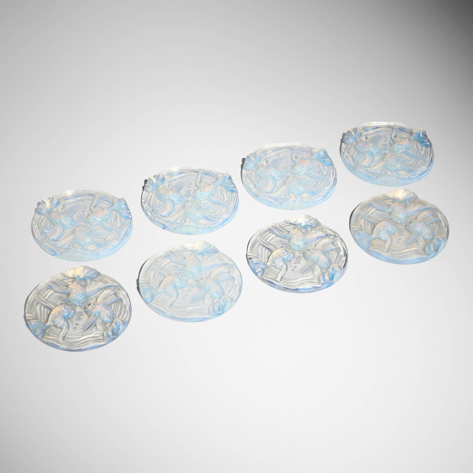 Verlys, Goldfish plates, set of eight: Verlys Goldfish plates, set of eight France, c. 1940 molded glass 0.5 h x 4.75 dia in (1 x 12 cm) Molded manufacturer's mark to face of each plate 'Verlys France'. This work
