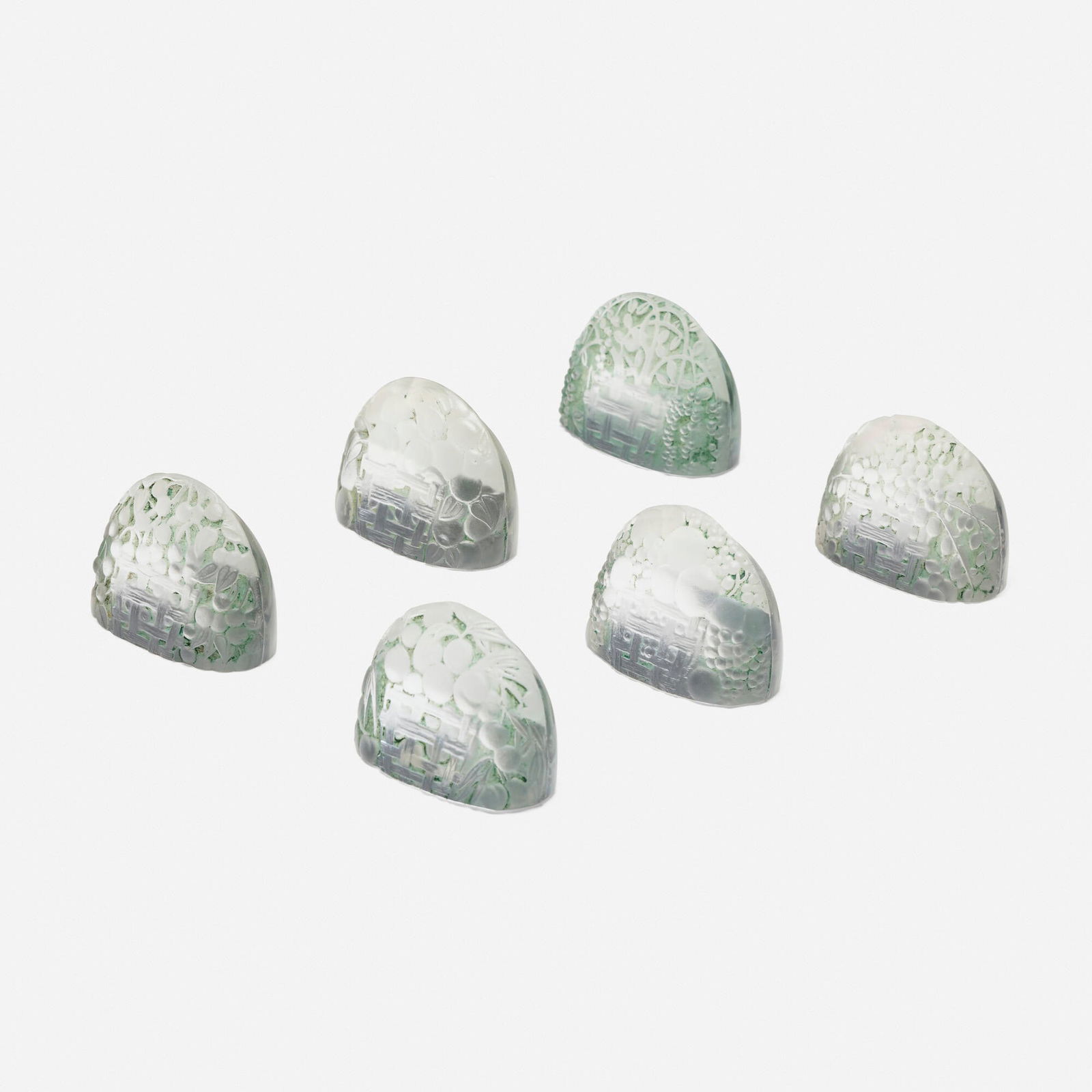 Rene Lalique, Panier de Fruits menu holders, set of six: Rene Lalique Panier de Fruits menu holders, set of six France, c. 1924glass with green patina 1.75 h x 2 w x 1 d in (4 x 5 x 3 cm) Incised signature to reverse of each example 'R. Lalique'.