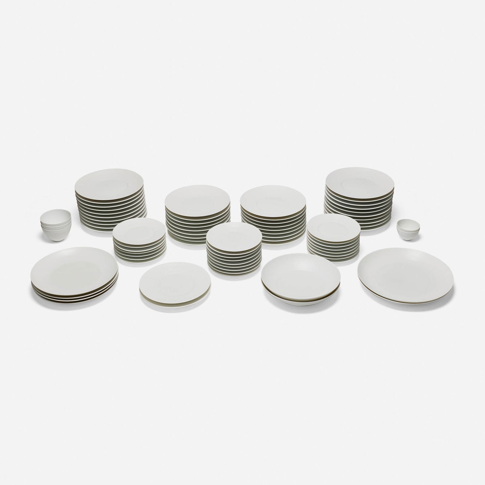 J.L. Coquet, Collection of Hemisphere dinnerware: J.L. Coquet Collection of Hemisphere dinnerware France, c. 2000 glazed porcelain largest: 1.75 h x 13.75 dia in (4 x 35 cm) smallest: 2.5 h x 3.75 dia in (6 x 10 cm) Lot is comprised of twenty