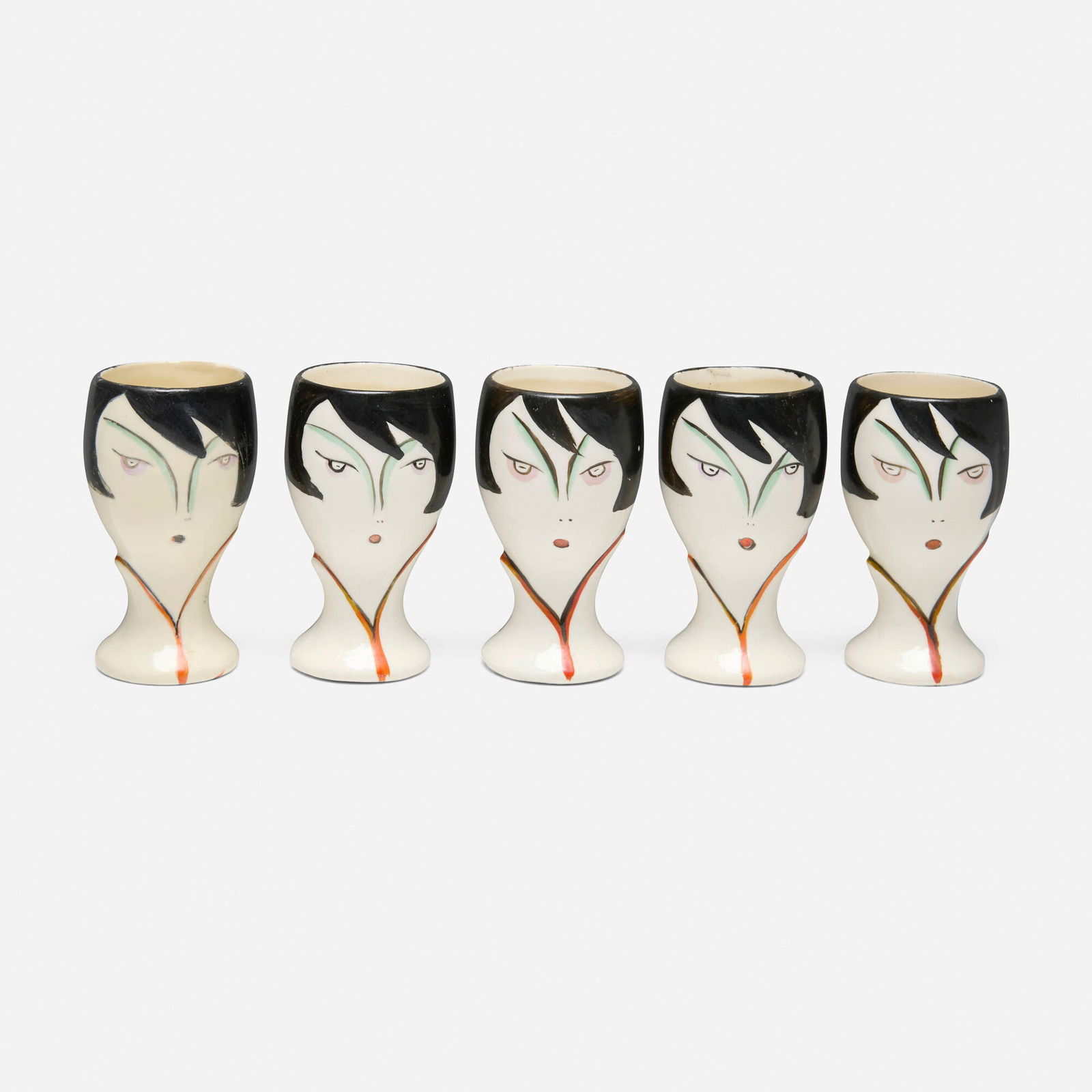 Goebel, Egg cups with female portrait, set of five: Goebel Egg cups with female portrait, set of five Germany, 1935-49painted porcelain 2.75 h x 1.75 dia in (7 x 4 cm) Impressed manufacturer's marks to underside of four examples.