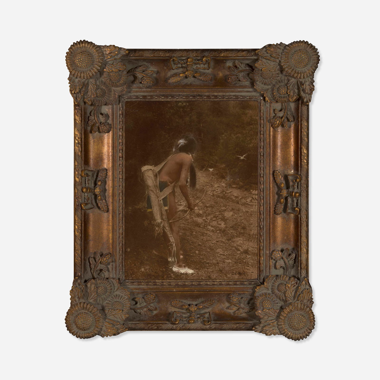 Carl Moon, The Hunter, in exceptional Arts & Crafts frame: Carl Moon The Hunter, in exceptional Arts & Crafts frame 1914 photogravure in colors laid to board, carved wood 15.5 h x 11.875 w in (39 x 30 cm) Signed to lower right 'Carl Moon'. Provenance:
