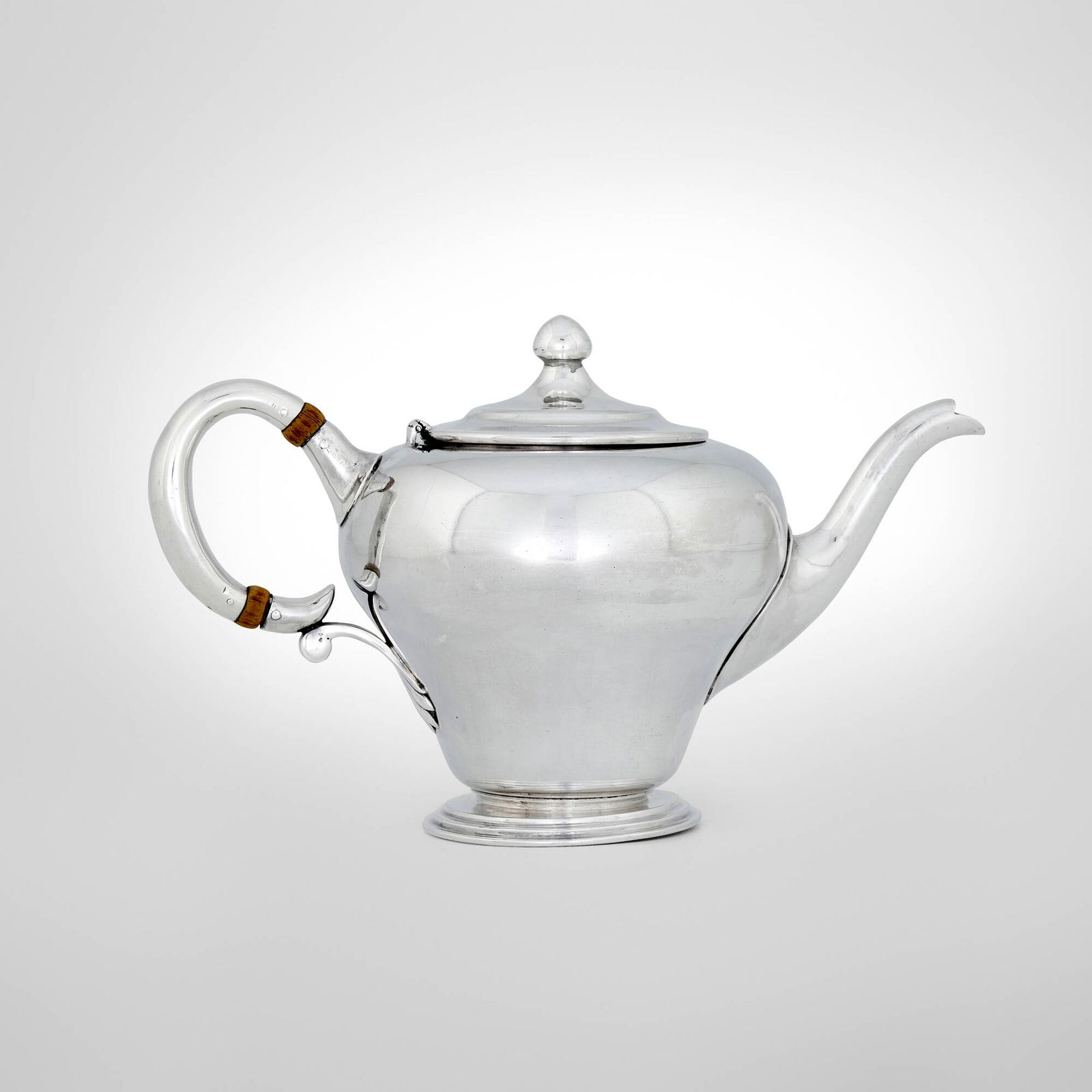 Clemens Friedell, Teapot: Clemens Friedell Teapot Pasadena, USA, c. 1920sterling silver, wood 5.5 h x 9.25 w x 4.75 d in (14 x 23 x 12 cm) Impressed signature to underside 'Sterling Friedell Pasadena'. 19.116 ozt. (gro