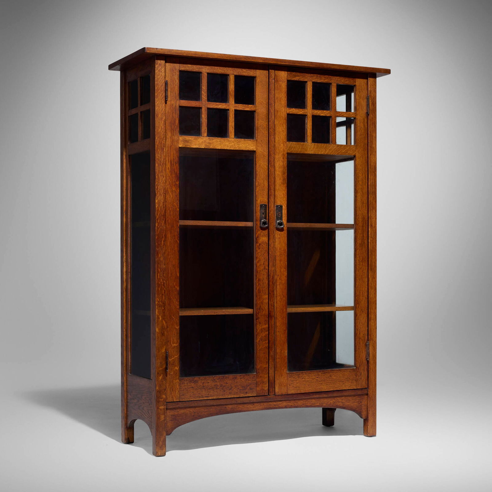 L. & J.G. Stickley, China cabinet, model 746: L. & J.G. Stickley China cabinet, model 746 USA, c. 1906-12 oak, brass, iron, glass 62 h x 44 w x 16.5 d in (157 x 112 x 42 cm) Cabinet features two doors concealing one fixed shelf and two