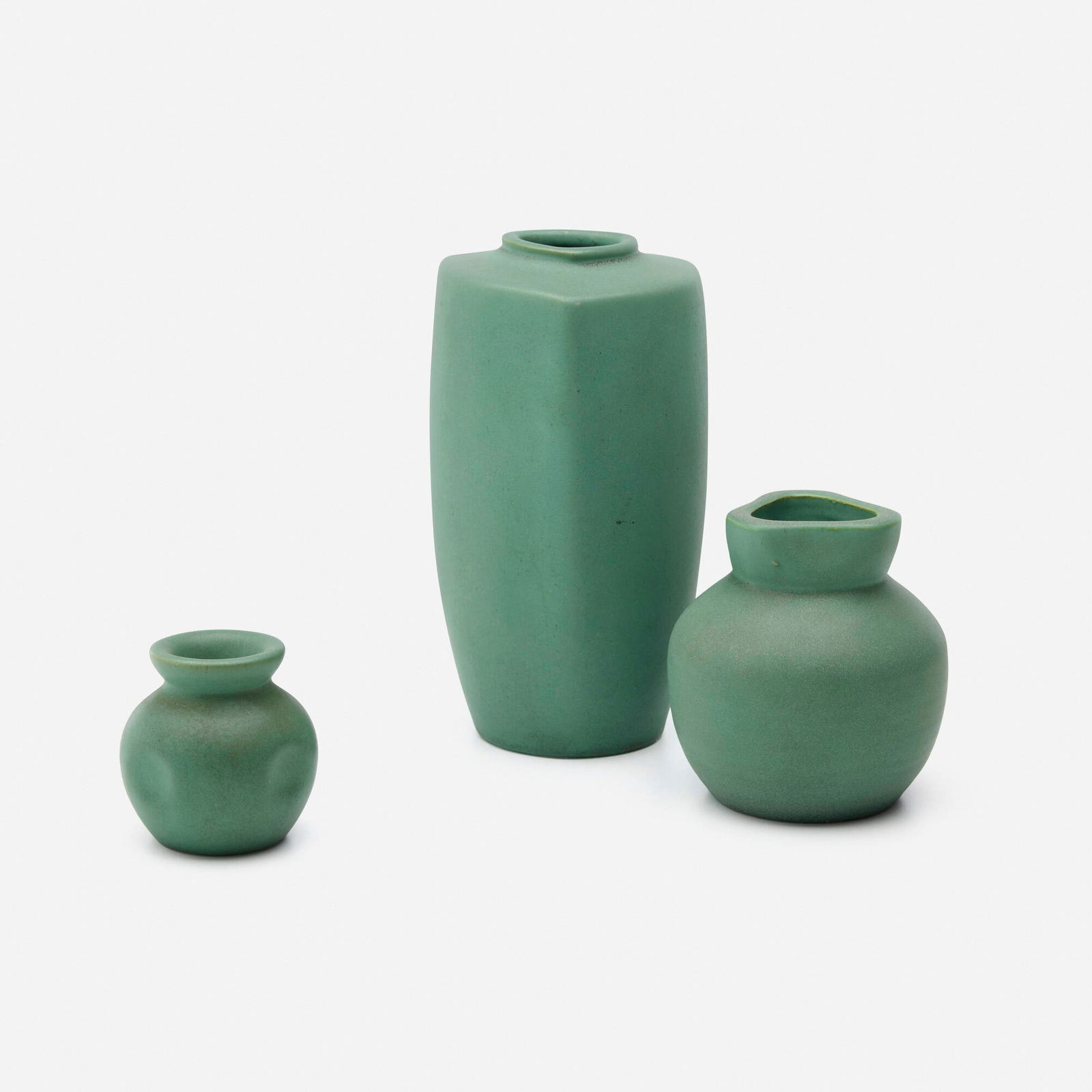 Teco Pottery, Collection of three vases: Teco Pottery Collection of three vases USA, c. 1904 glazed earthenware 7.75 h x 4 dia in (20 x 10 cm) 4.5 h x 4.25 dia in (11 x 11 cm) 3 h x 2.75 dia in (8 x 7 cm) Collection is comprised of
