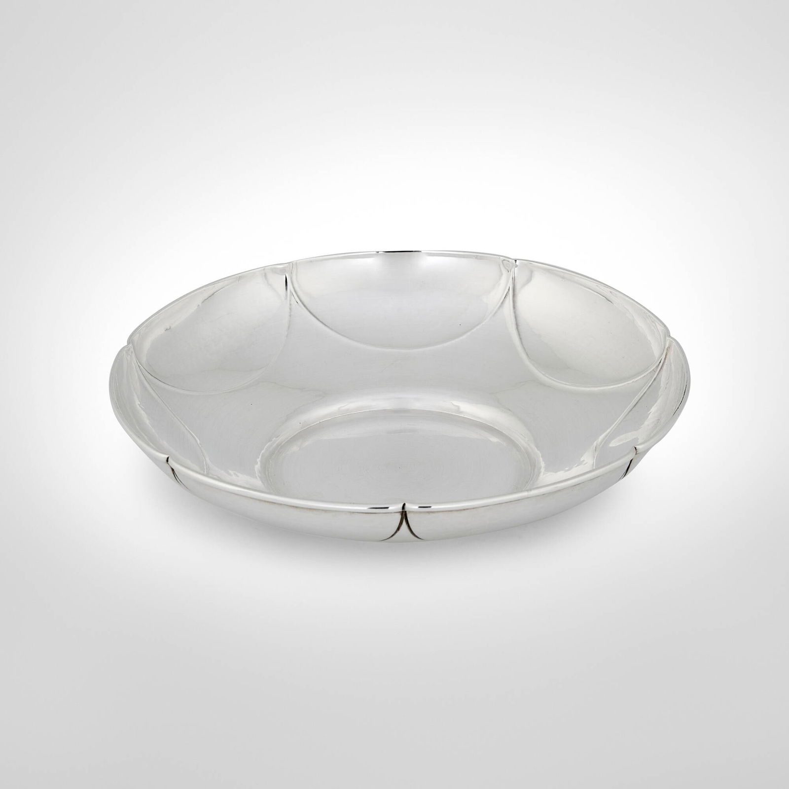 The Kalo Shop, Round lobed bowl with star motif: The Kalo Shop Round lobed bowl with star motif Chicago, USA, first half of the 20th century sterling silver 1.625 h x 8.25 dia in (4 x 21 cm) Impressed manufacturer's mark to underside 'Sterling