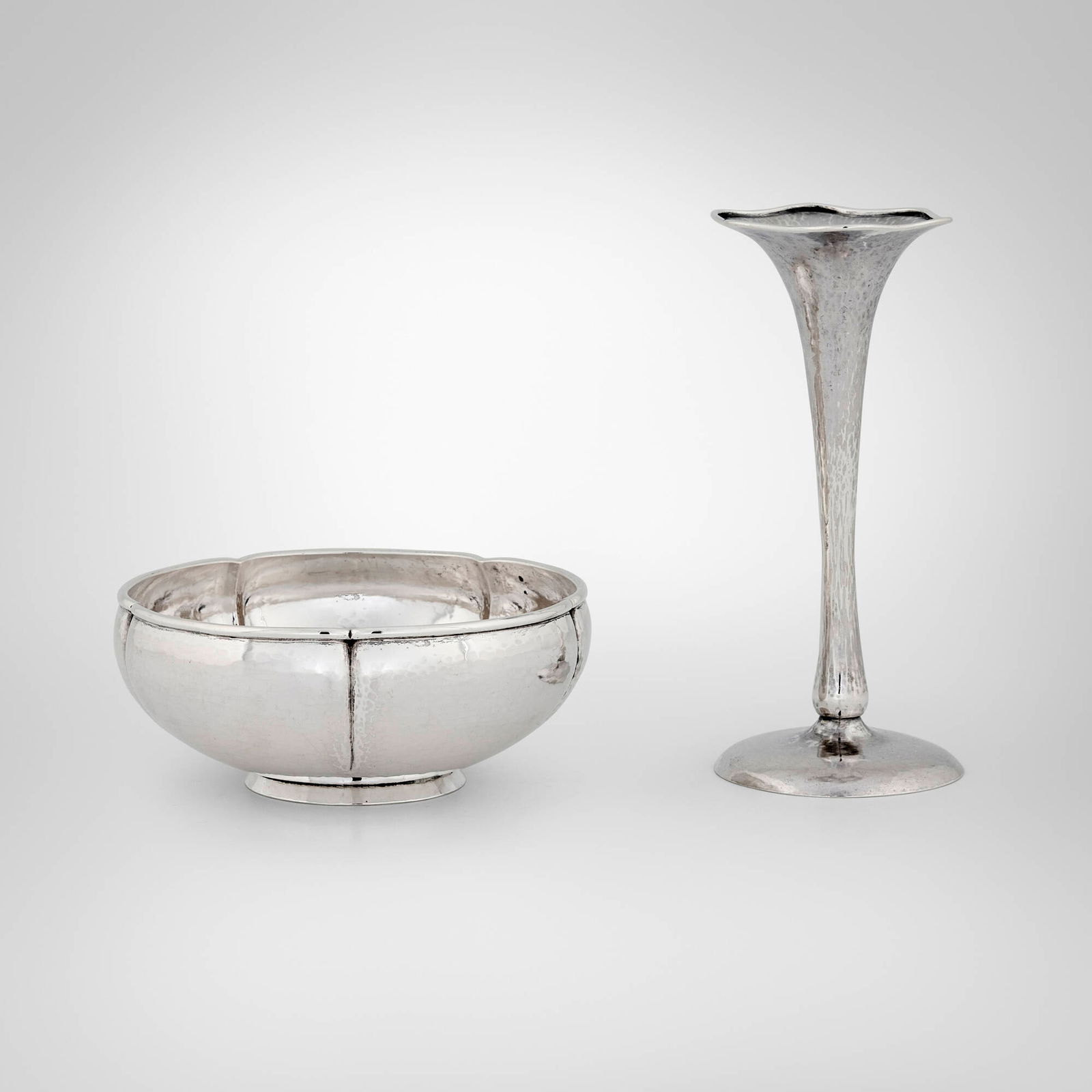 The Kalo Shop, Table articles, set of two: The Kalo Shop Table articles, set of two Chicago, USA, c. 1912-16, first half of the 20th century sterling silver 6 h x 2.625 dia in (15 x 7 cm) 2.125 h x 5.125 dia in (5 x 13 cm) Set is comprised