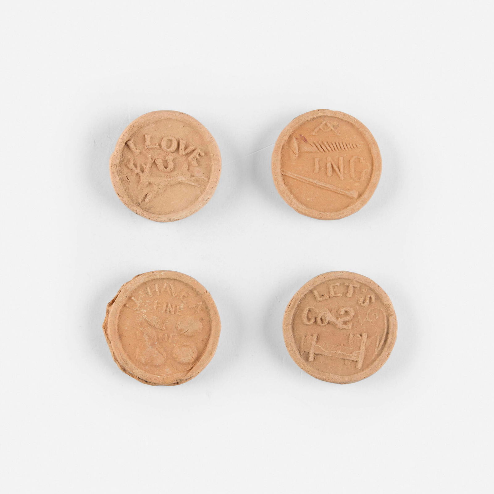 George E. Ohr, Collection of four brothel tokens: George E. Ohr Collection of four brothel tokens USA, c. 1900 bisque earthenware each: 1.25 dia in (3 cm) Provenance: Estate of Martin and Estelle Shack This work will ship from Lambertville, New