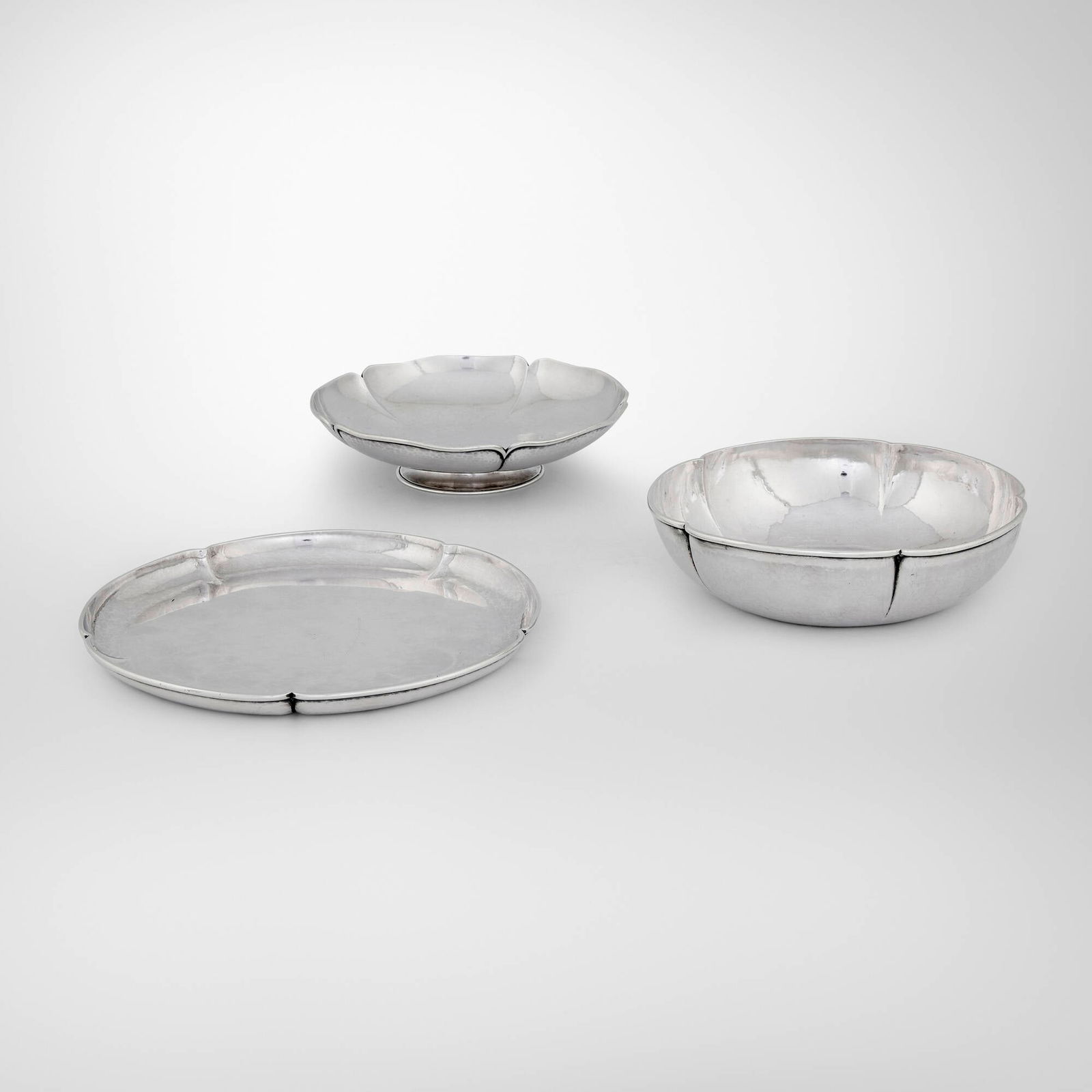 The Kalo Shop, Collection of three round lobed table articles: The Kalo Shop Collection of three round lobed table articles Chicago, USA, first half of the 20th century sterling silver 1.875 h x 7.125 dia in (5 x 18 cm) 1.75 h x 7 dia in (4 x 18 cm) 0.5 h x