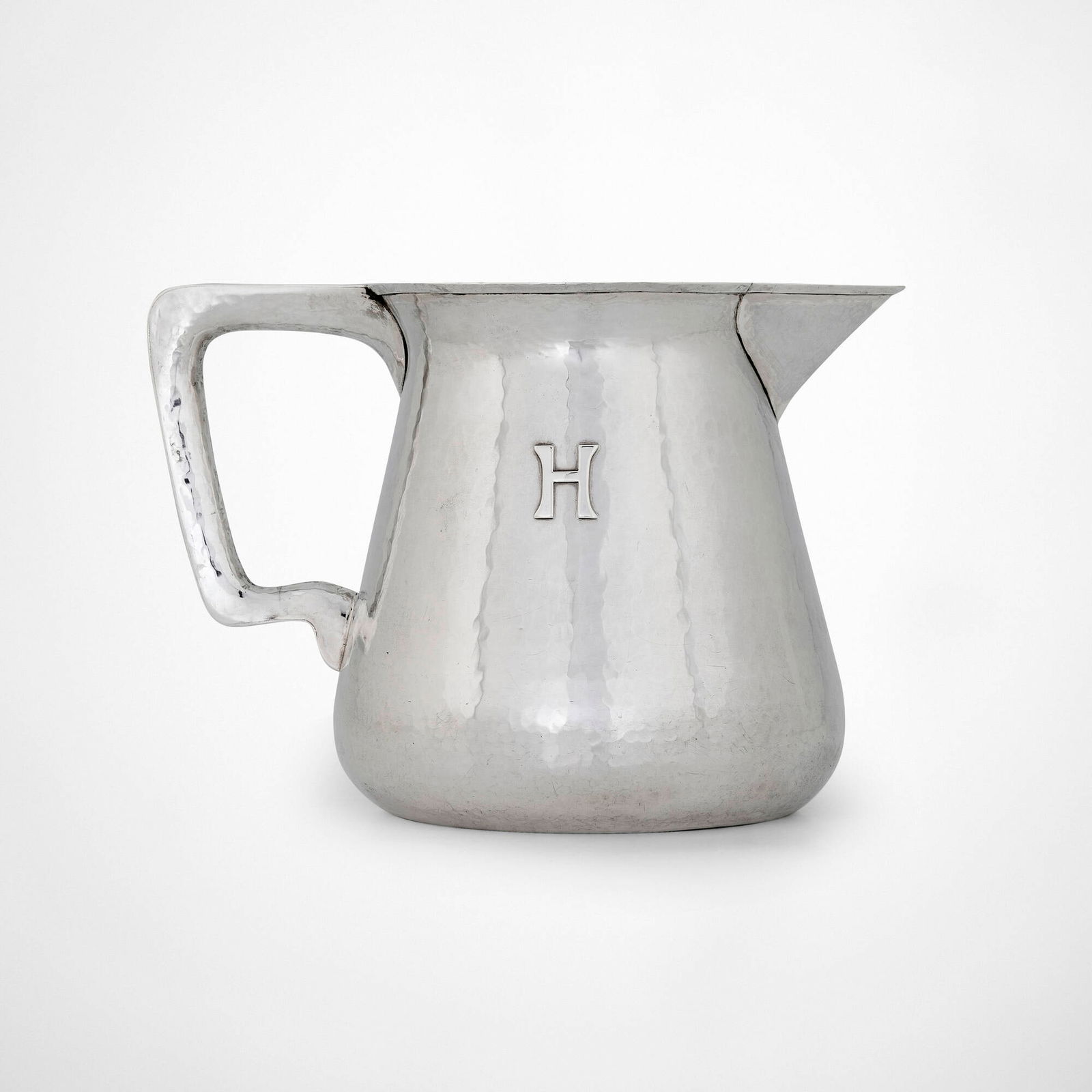 Lebolt & Co., Water pitcher: Lebolt & Co. Water pitcher Chicago, USA, c. 1920 sterling silver 6.5 h x 9.25 w x 5.75 d in (17 x 23 x 15 cm) Impressed manufacturer's mark to underside 'Lebolt Handmade Sterling 800 5 3/4 Pints'.
