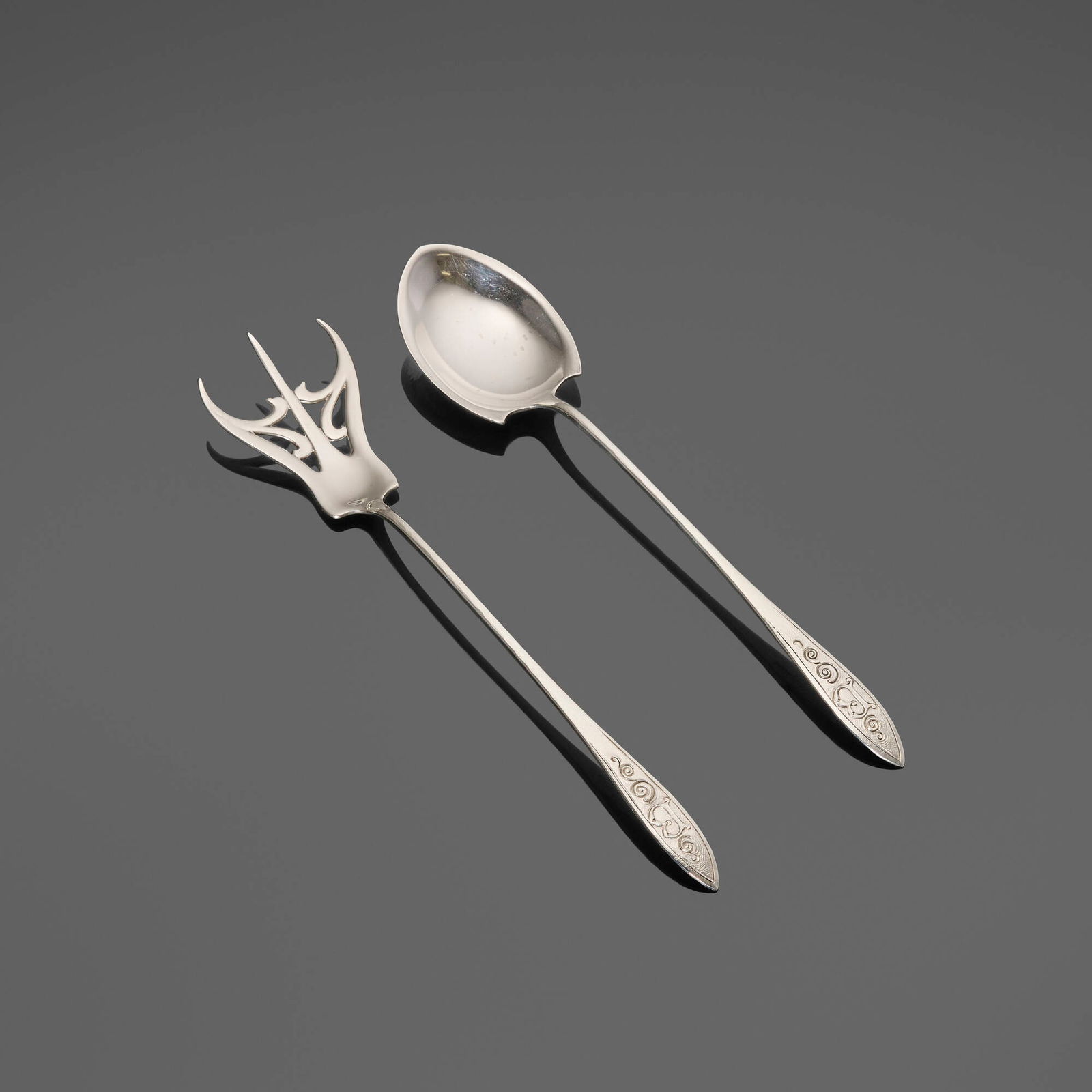 Towle Silversmiths and Albert Wehde, Lafayette salad serving set: Towle Silversmiths and Albert Wehde Lafayette salad serving set USA, c. 1905-14 sterling silver 1 h x 9.5 w x 2 d in (3 x 24 x 5 cm) 0.75 h x 9.75 w x 2 d in (2 x 25 x 5 cm) Set is comprised of a