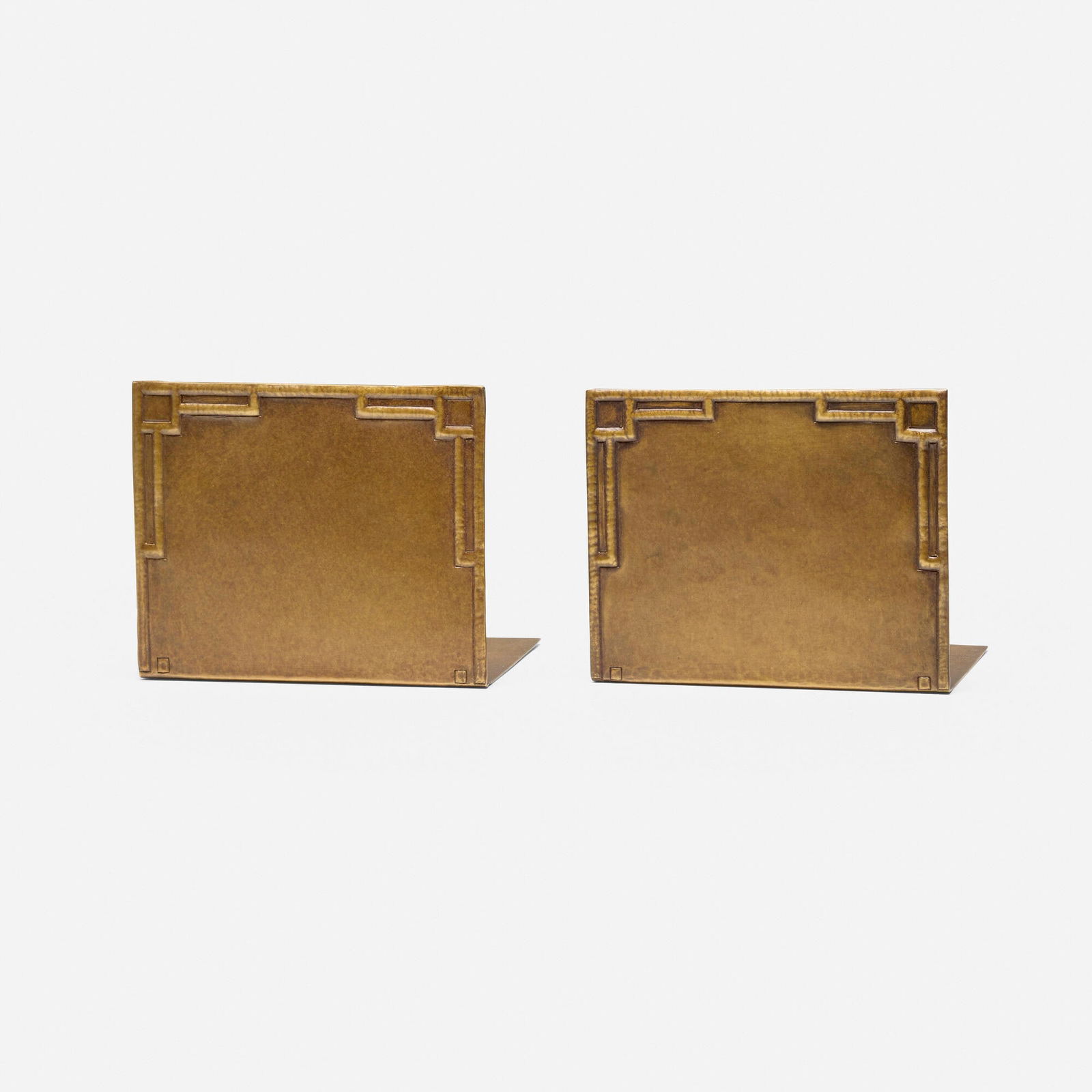 Robert Jarvie, Bookends, pair: Robert Jarvie Bookends, pair USA, c. 1906brass-washed copper 4.5 h x 5.625 w x 4 d in (11 x 14 x 10 cm) Incised signature to lower edge of each example 'Jarvie'. This work