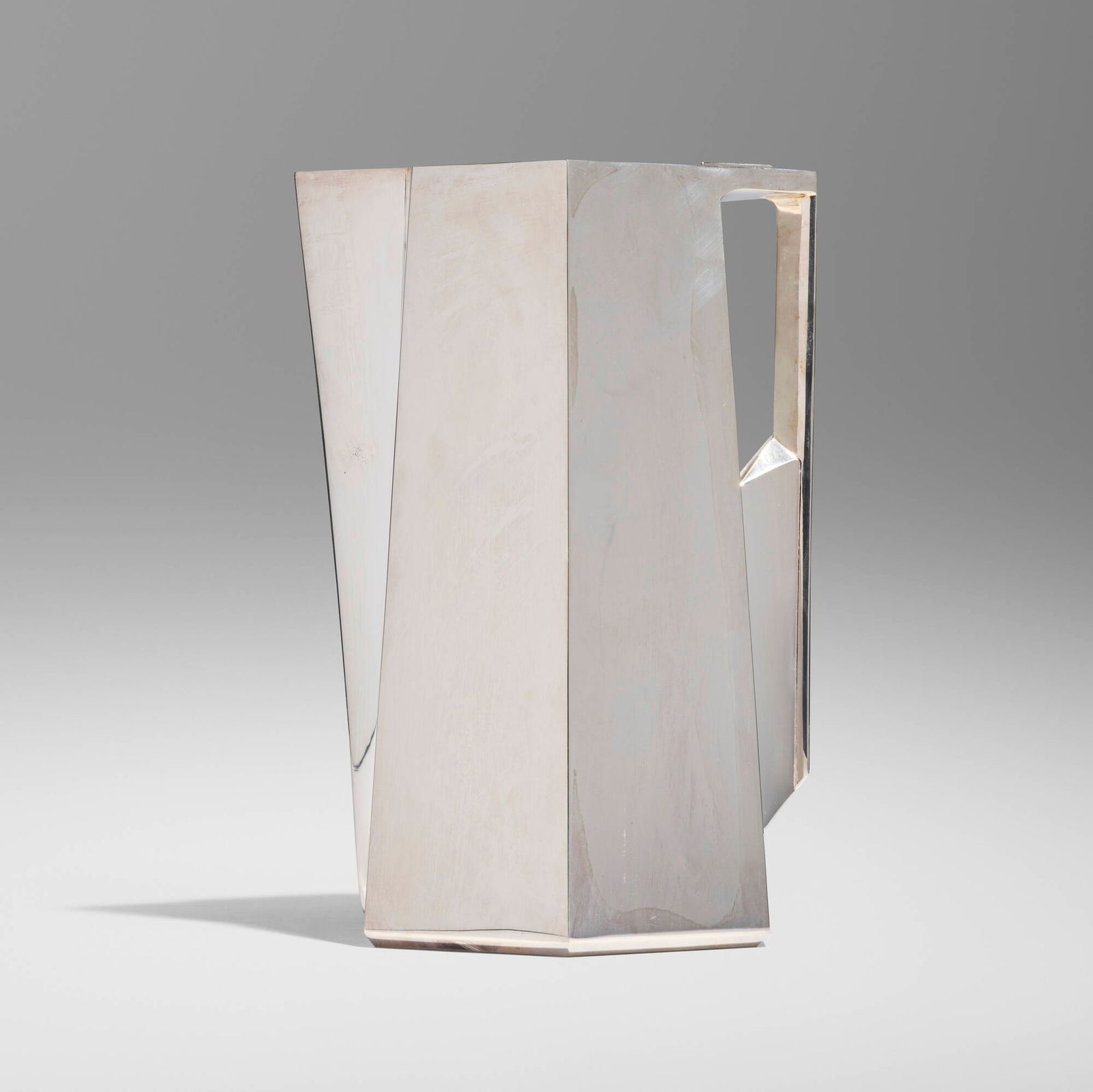 After Frank Lloyd Wright, Rare pitcher: After Frank Lloyd Wright Rare pitcher Pampaloni Agenti Florence, Italy, 1918 / c. 1985 sterling silver 10 h x 7 w x 4.5 d in (25 x 18 x 11 cm) The present form, originally designed by Wright for
