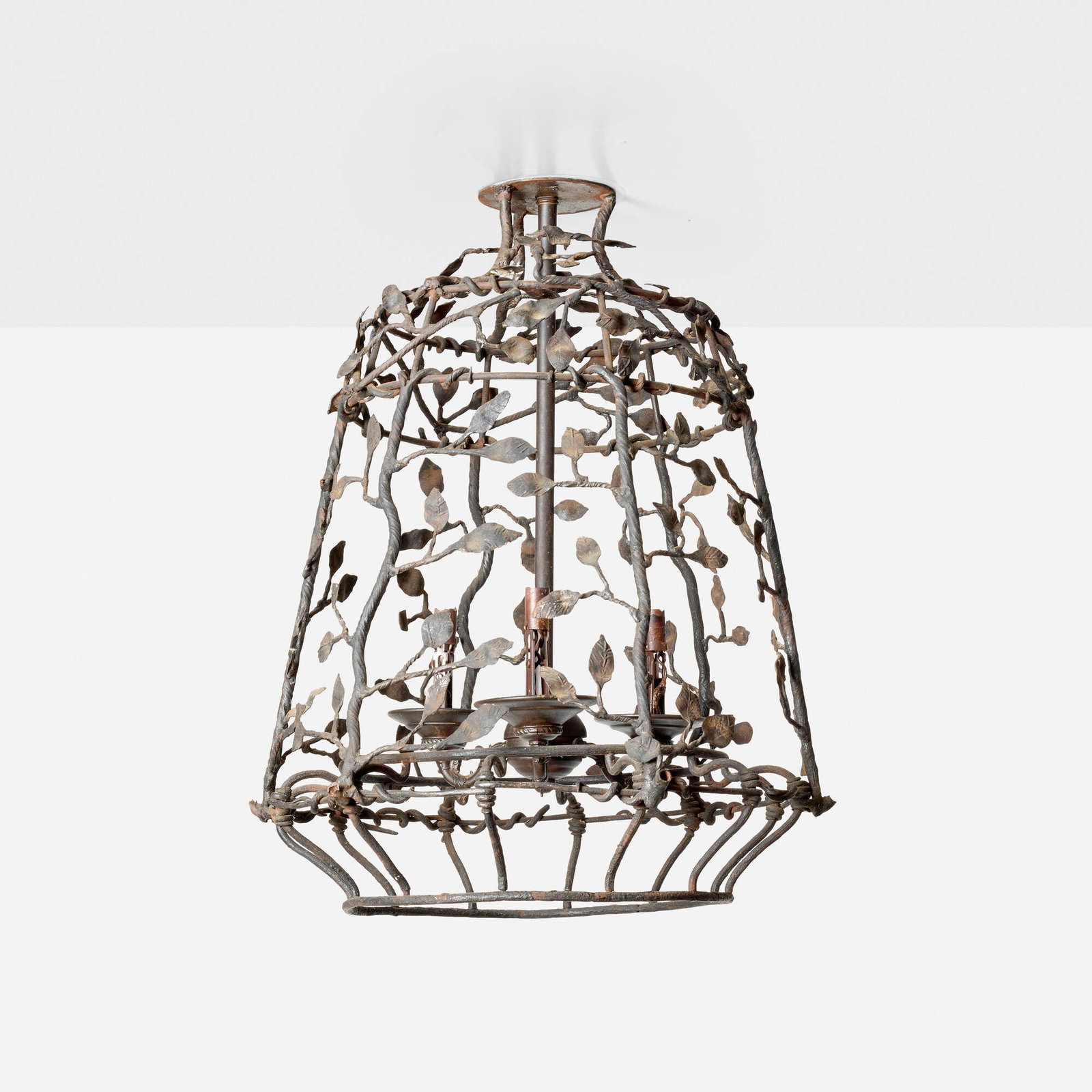 In the manner of Diego Giacometti, Ceiling light: In the manner of Diego Giacometti Ceiling light late 20th centurysteel 25 h x 18 dia in (63 x 46 cm) This work will ship from Los Angeles, California.