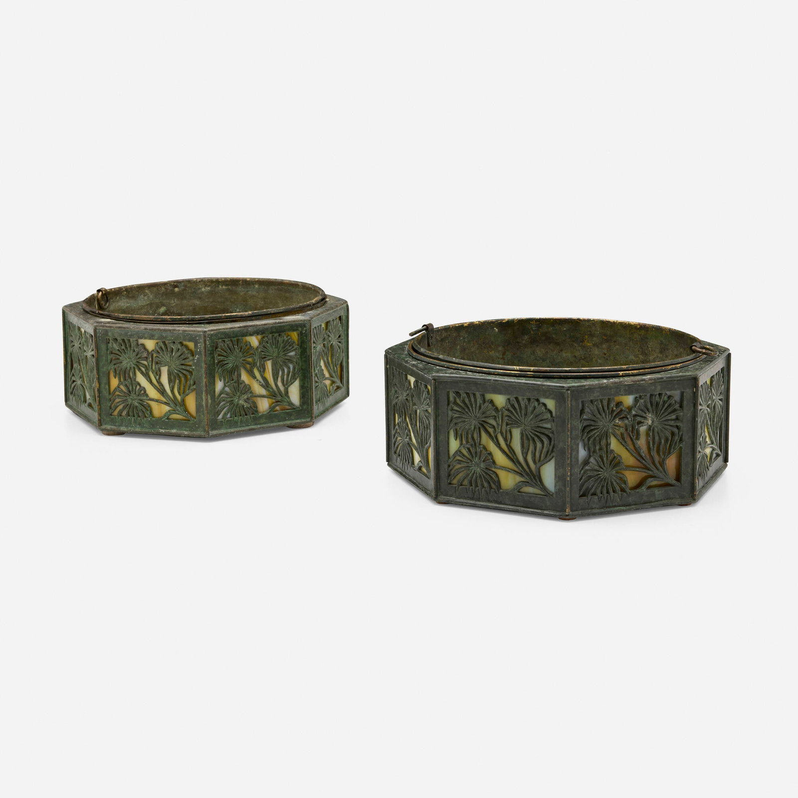 Bradley & Hubbard, attribution, Palms overlay ferneries, pair: Bradley & Hubbard, attribution Palms overlay ferneries, pair USA, c. 1915 metal with Frog Skin patina, slag glass 4.25 h x 10 dia in (11 x 25 cm) Provenance: Collection of Gary Diamond, Los