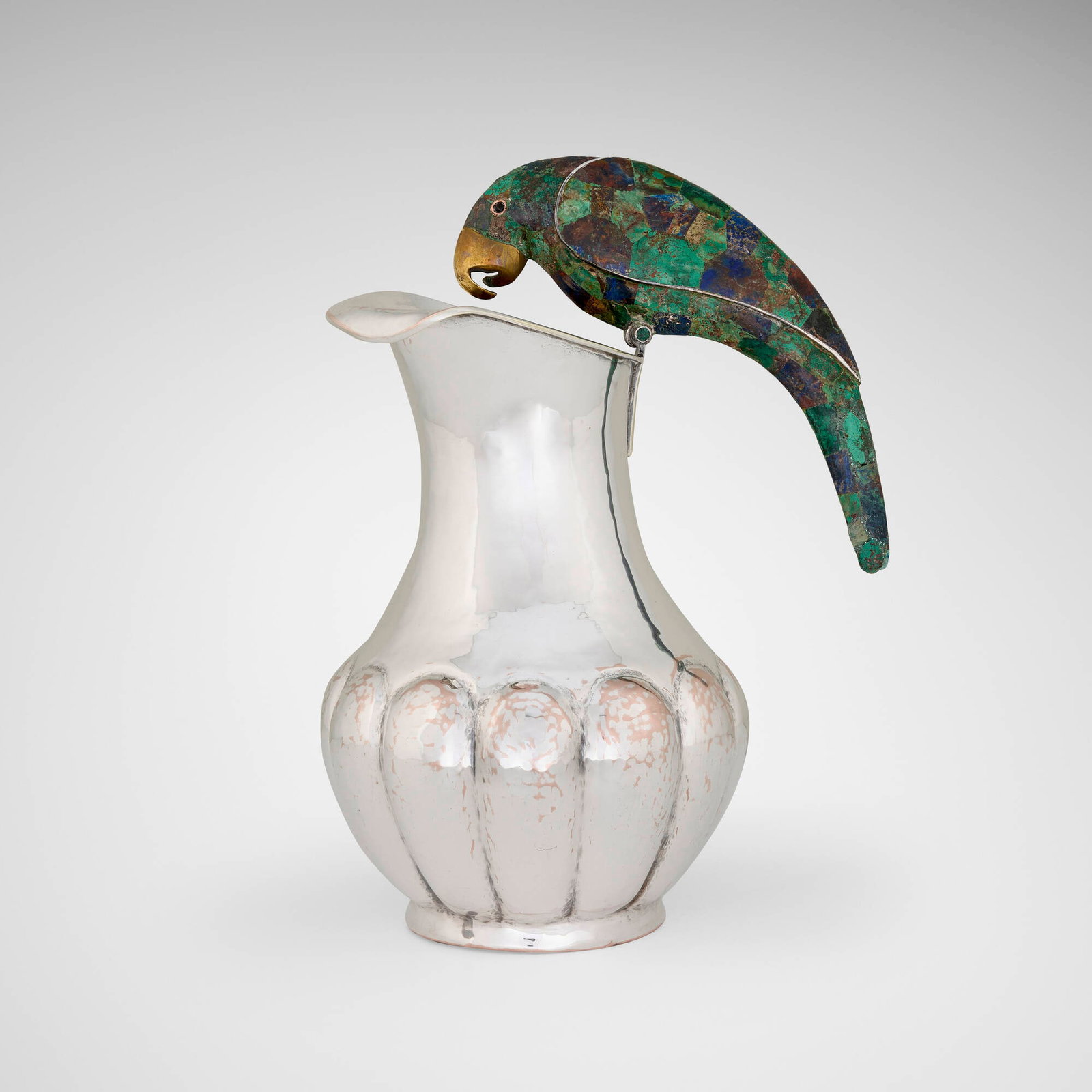 Los Castillo, Pitcher with parrot handle: Los Castillo Pitcher with parrot handle Mexico, c. 1980 silver-plated copper, hardstone inlay, brass 11.75 h x 9 w x 6.5 d in (30 x 23 x 17 cm) Impressed manufacturer's mark to underside 'TR-01