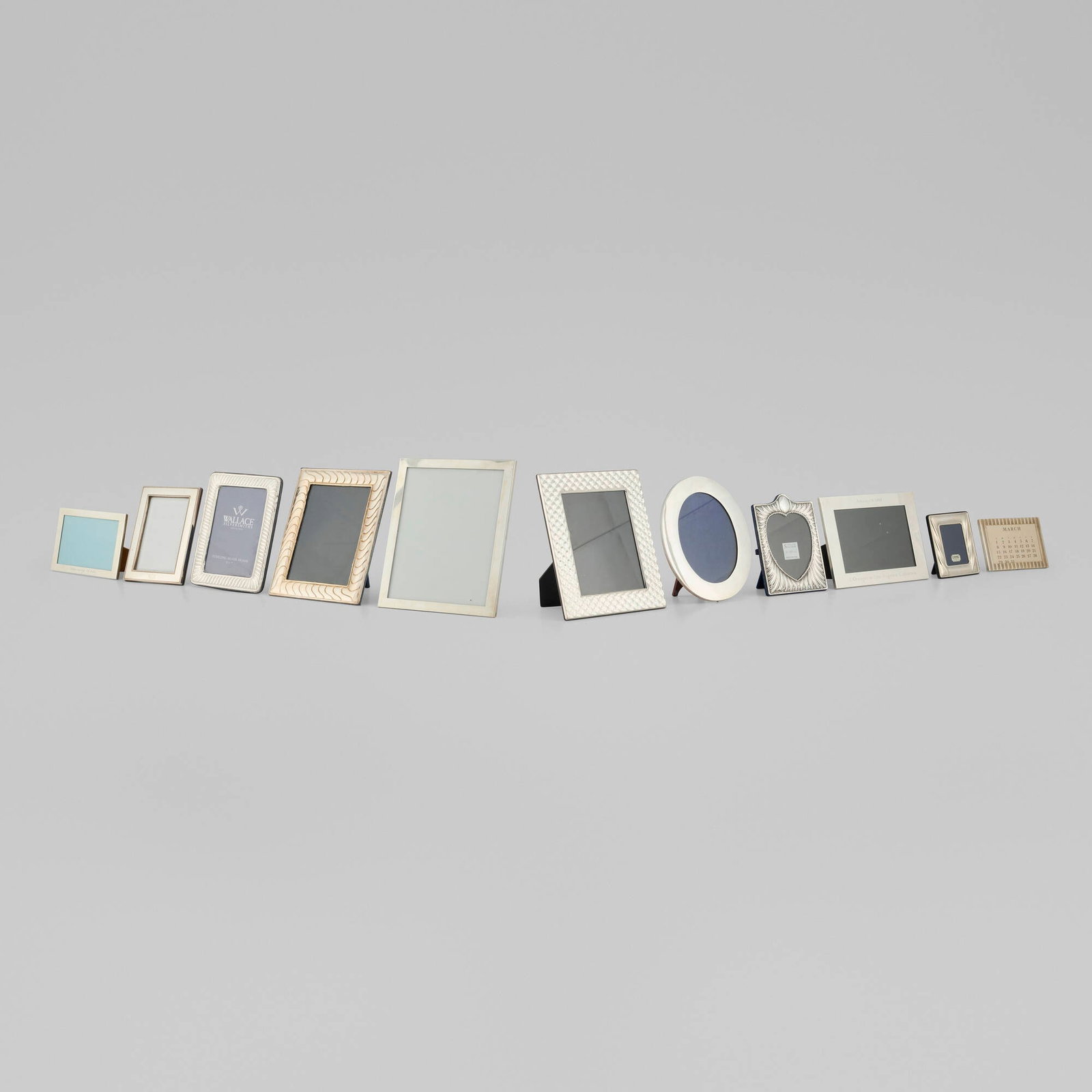 Tiffany & Co., Collection of eleven picture and calendar frames: Tiffany & Co. Collection of eleven picture and calendar frames New York, USA, c. 1990-2010sterling silver 10.25 h x 8.125 w x 0.5 d in (26 x 21 x 1 cm) 4.25 h x 6 w x 1.875 d in (11 x 15 x 5 cm)