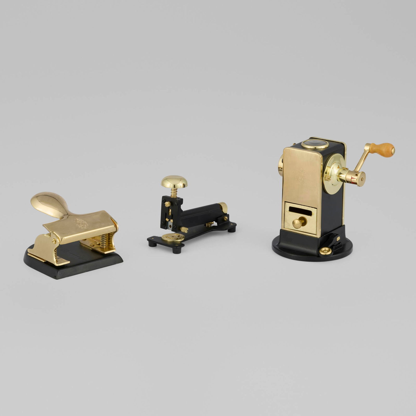 El Casco, Desk accessories, set of three: El Casco Desk accessories, set of three Spain, 21st century copper, nickel and 23k gold-plated steel, enamel, wood, glass 6 h x 6 w x 4.5 d in (15 x 15 x 11 cm) 4 h x 5 w x 2.25 d in (10 x 13 x 6