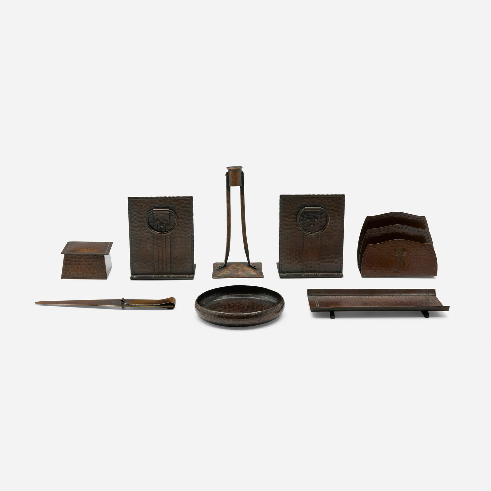 Roycroft and Karl Kipp, Collection of eight desk articles: Roycroft and Karl Kipp Collection of eight desk articles USA, c. 1920 handwrought copper, glass largest: 5.25 h x 4 w x 3 d in (13 x 10 x 8 cm) smallest: 1.75 h x 3 w x 3 d in (4 x 8 x 8 cm) 