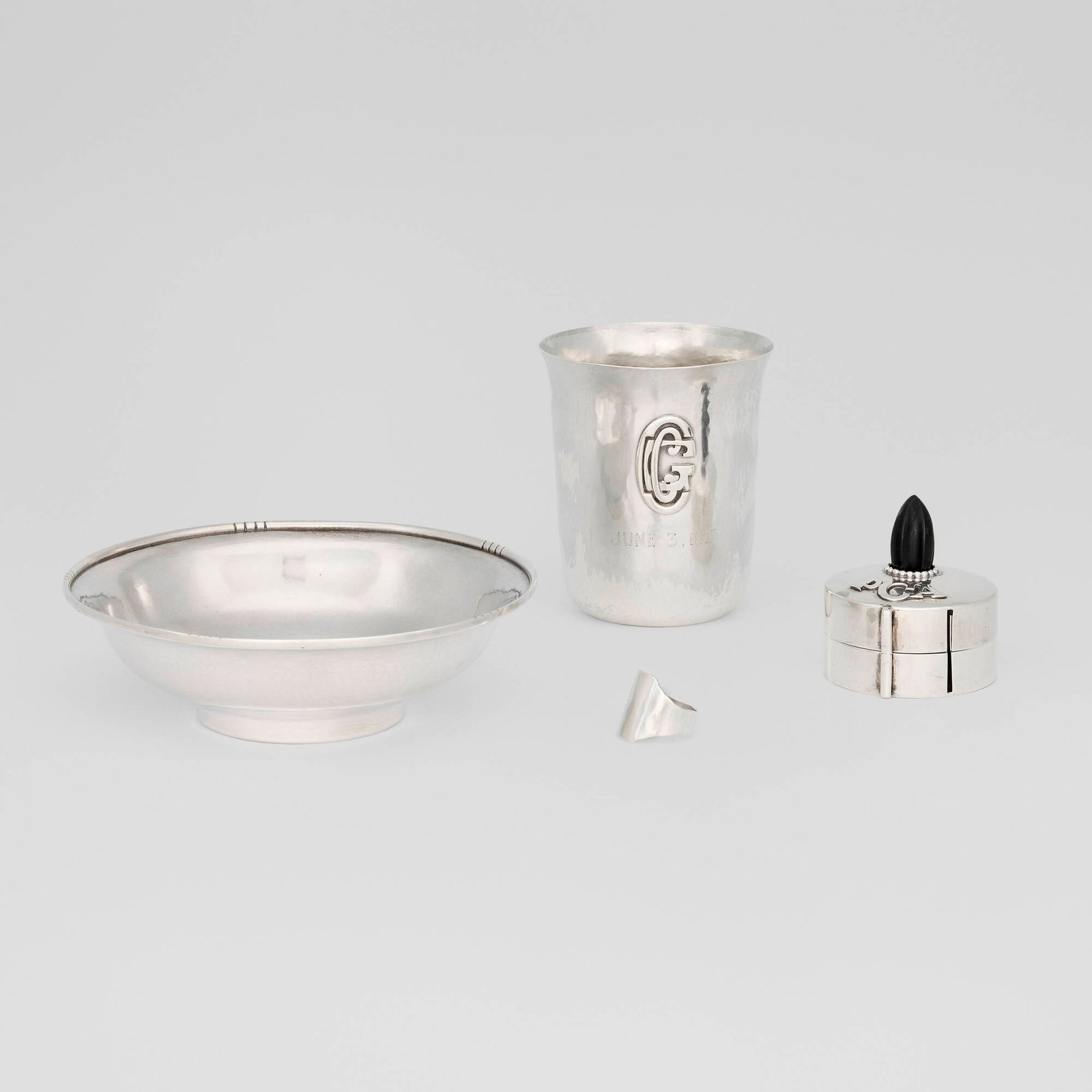 The Kalo Shop, Collection of four works: The Kalo Shop Collection of four works Chicago, USA, 20th century sterling silver, lacquered wood largest: 1.75 h x 5.75 dia in (4 x 15 cm) smallest: 0.75 h x 0.75 dia in (2 x 2 cm) Collection is