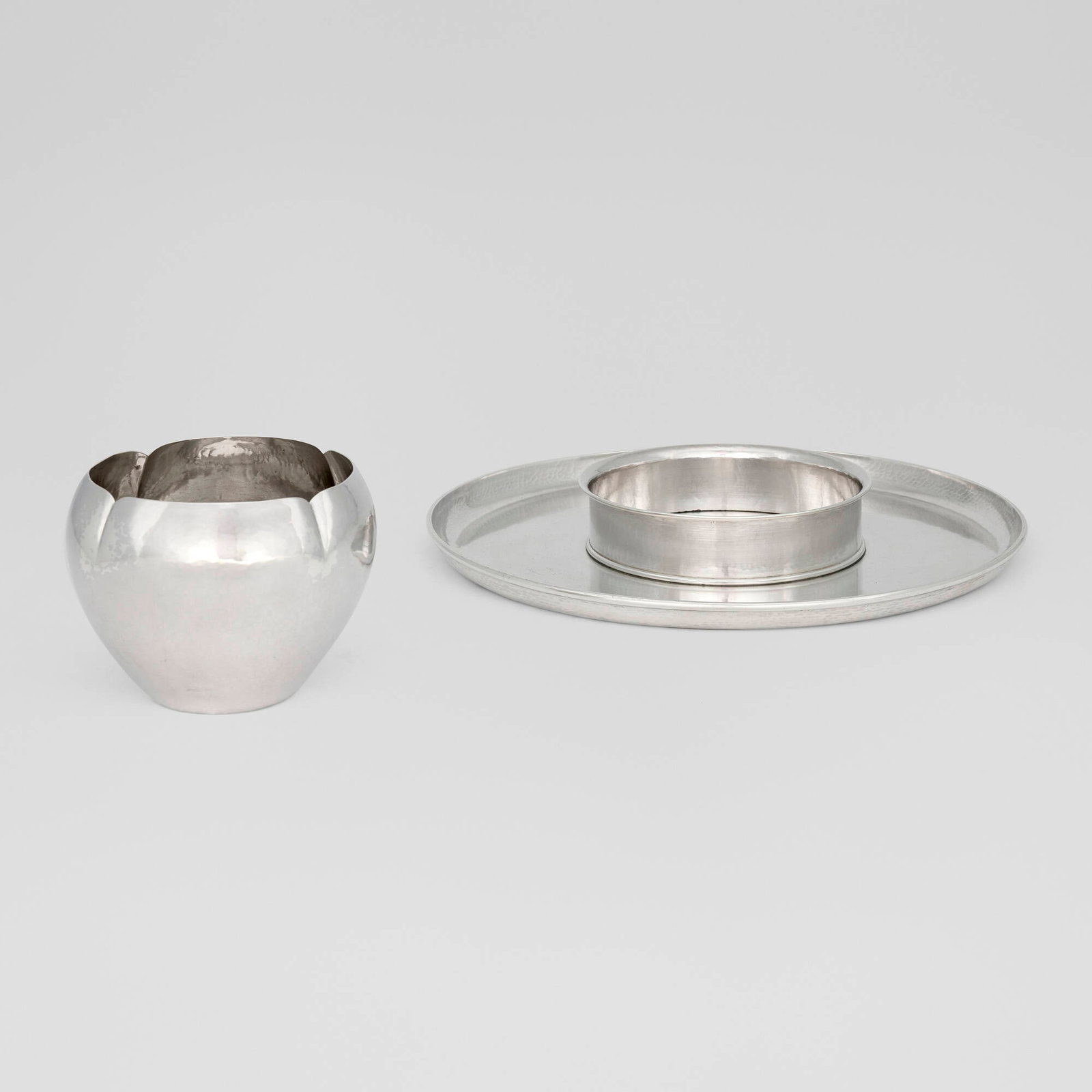 The Kalo Shop, Table articles, set of two: The Kalo Shop Table articles, set of two Chicago, USA, first half of the 20th centurysterling silver 3.5 h x 5 dia in (9 x 13 cm) 1.5 h x 11 dia in (4 x 28 cm) Collection is comprised of an