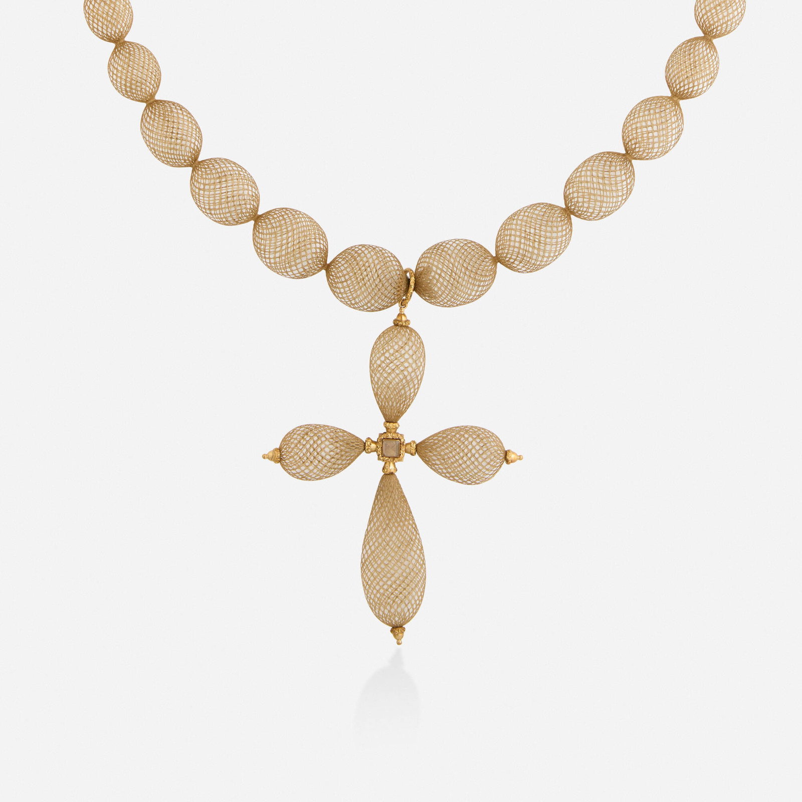 Victorian, Hair and gold mourning necklace: Victorian Hair and gold mourning necklace Designed with woven hair Yellow gold Necklace 32 in, pendant 4.50 x 3.125 in; Gross weight 3.9 dwts This work will ship from Lambertville, New