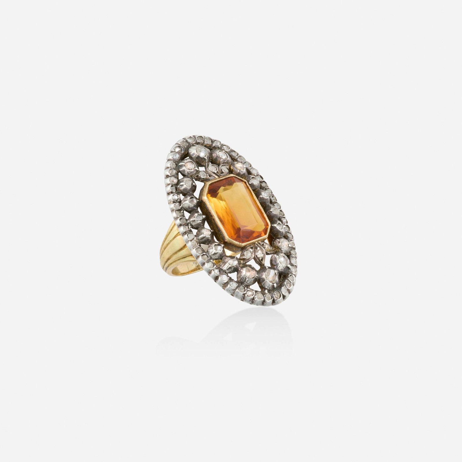Antique, French citrine and diamond ring: Antique French citrine and diamond ring Of pierced design, set with an octagonal-cut citrine and rose-cut diamonds Silver-topped 18k yellow gold Ring size approx. 7; Gross weight 7.3 dwts