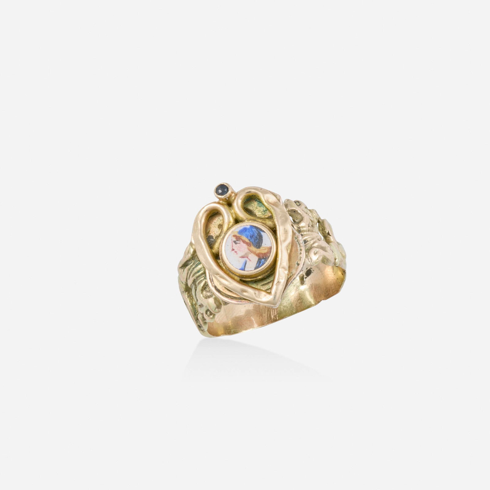 Victorian, Enamel, sapphire, and tricolor gold ring: Victorian Enamel, sapphire, and tricolor gold ring Set with a hand-painted enamel portrait, set with a circular-cut sapphire, the band of two scrolling dragons 12k yellow, pink, and white gold Ring si