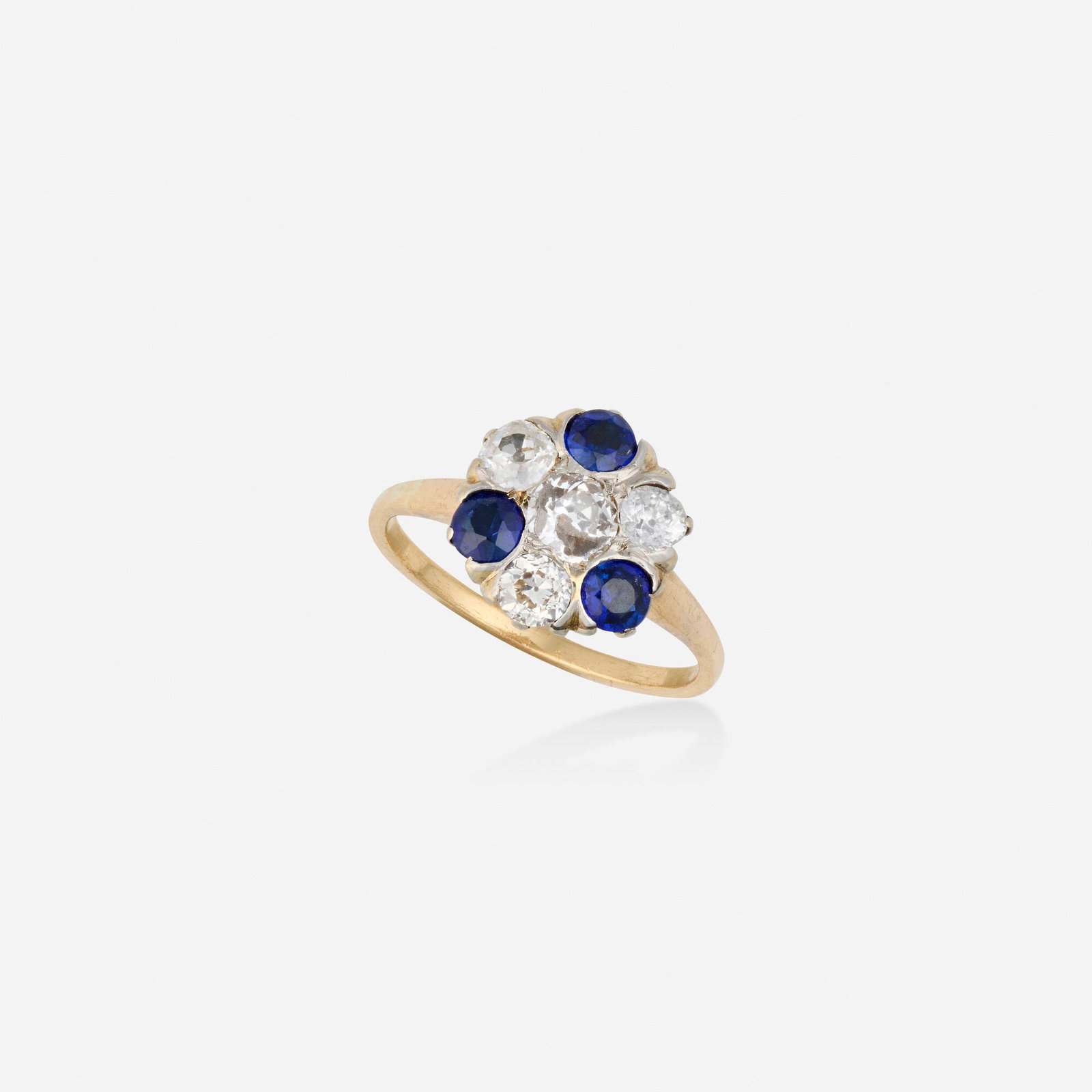 Antique, Sapphire, diamond, and gold ring: Antique Sapphire, diamond, and gold ring Set with circular-cut sapphires and old European-cut diamonds Silver-topped yellow gold Ring size 6.50; Gross weight 1.7 dwts This work will sh