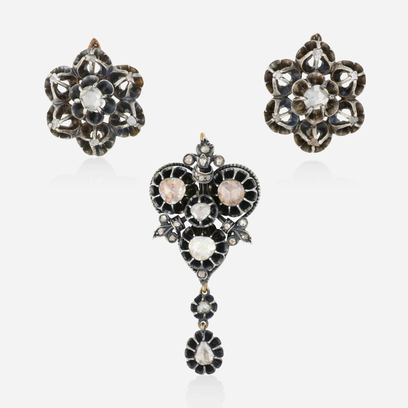Georgian, Diamond and silver-topped gold earrings and pendant: Georgian Diamond and silver-topped gold earrings and pendant Each set with rose-cut diamonds Silver-topped gold Earrings 0.875 x 0.75 in, pendant 1.75 x 0.875 in; Gross weight 13.4 dwts