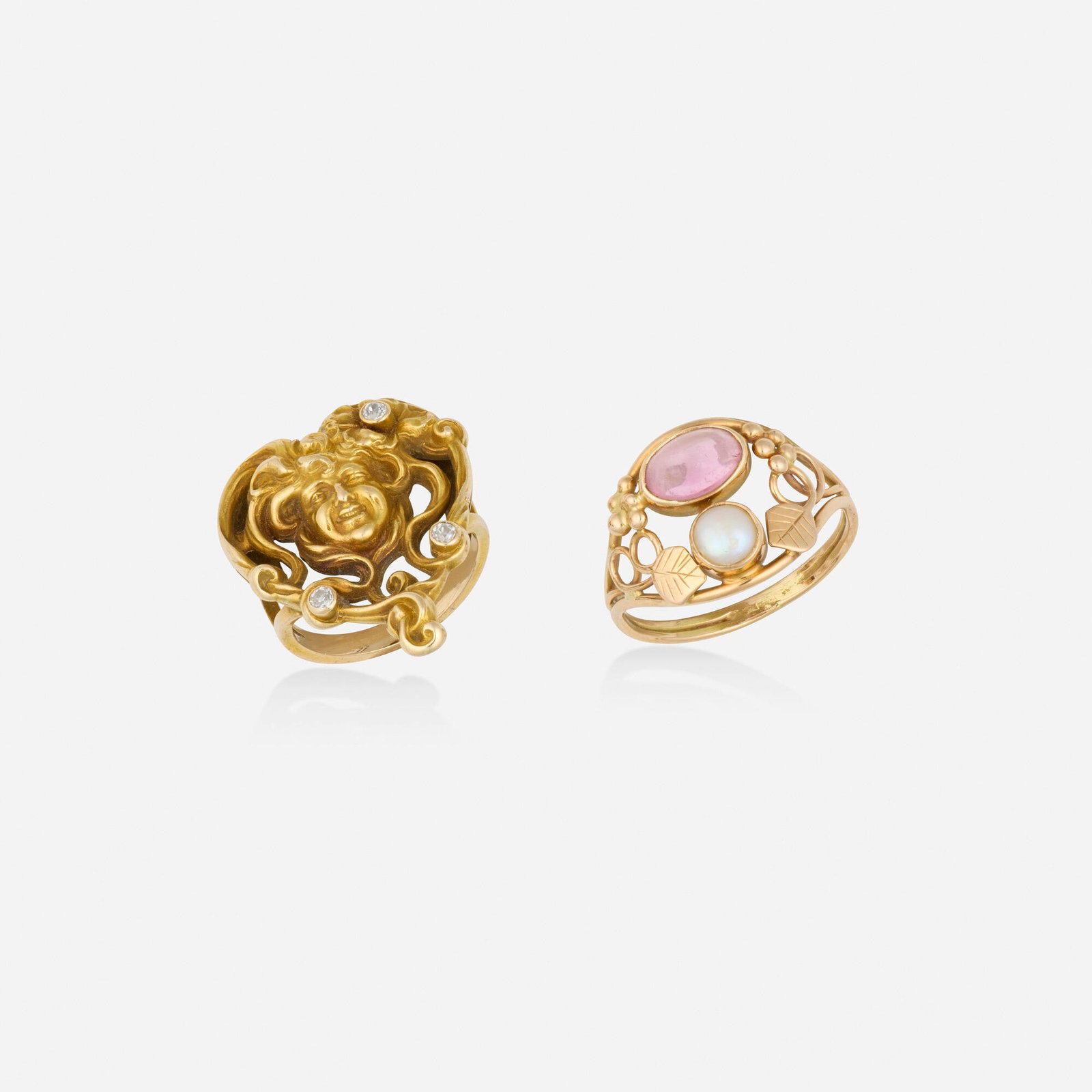 Art Nouveau, Two gold, diamond, and multi-gem rings: Art Nouveau Two gold, diamond, and multi-gem rings One depicting a woman's face, set with old mine-cut diamonds; the other of foliate design, set with a cabochon tourmaline and pearl Yellow gold Ring