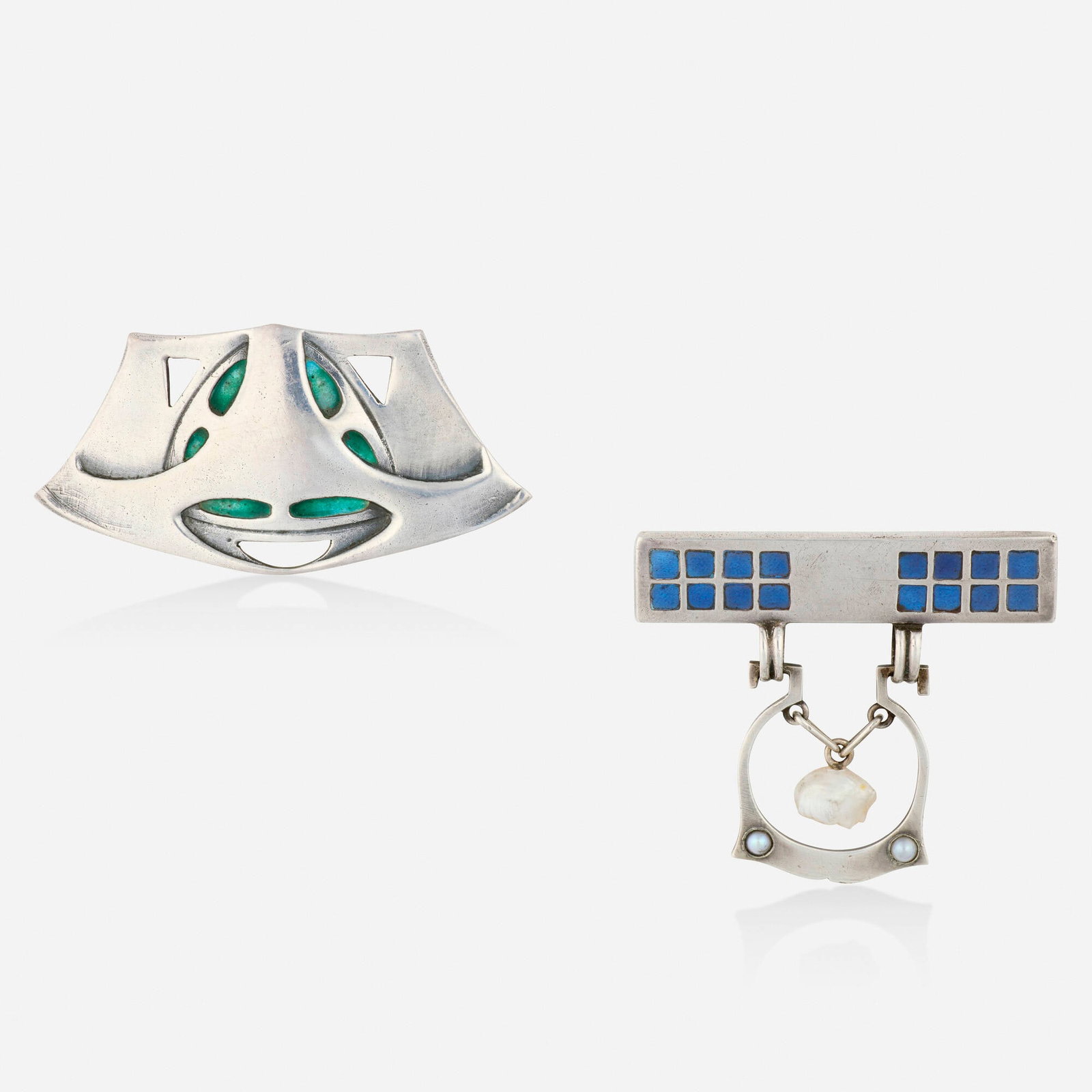 Jugendstil, Two German enamel and silver brooches: Jugendstil Two German enamel and silver brooches One of open-form design with green enamel; the other of blue enamel, enhanced with a hanging pendant of freshwater and seed pearls; 1900s Silver 1.75 x