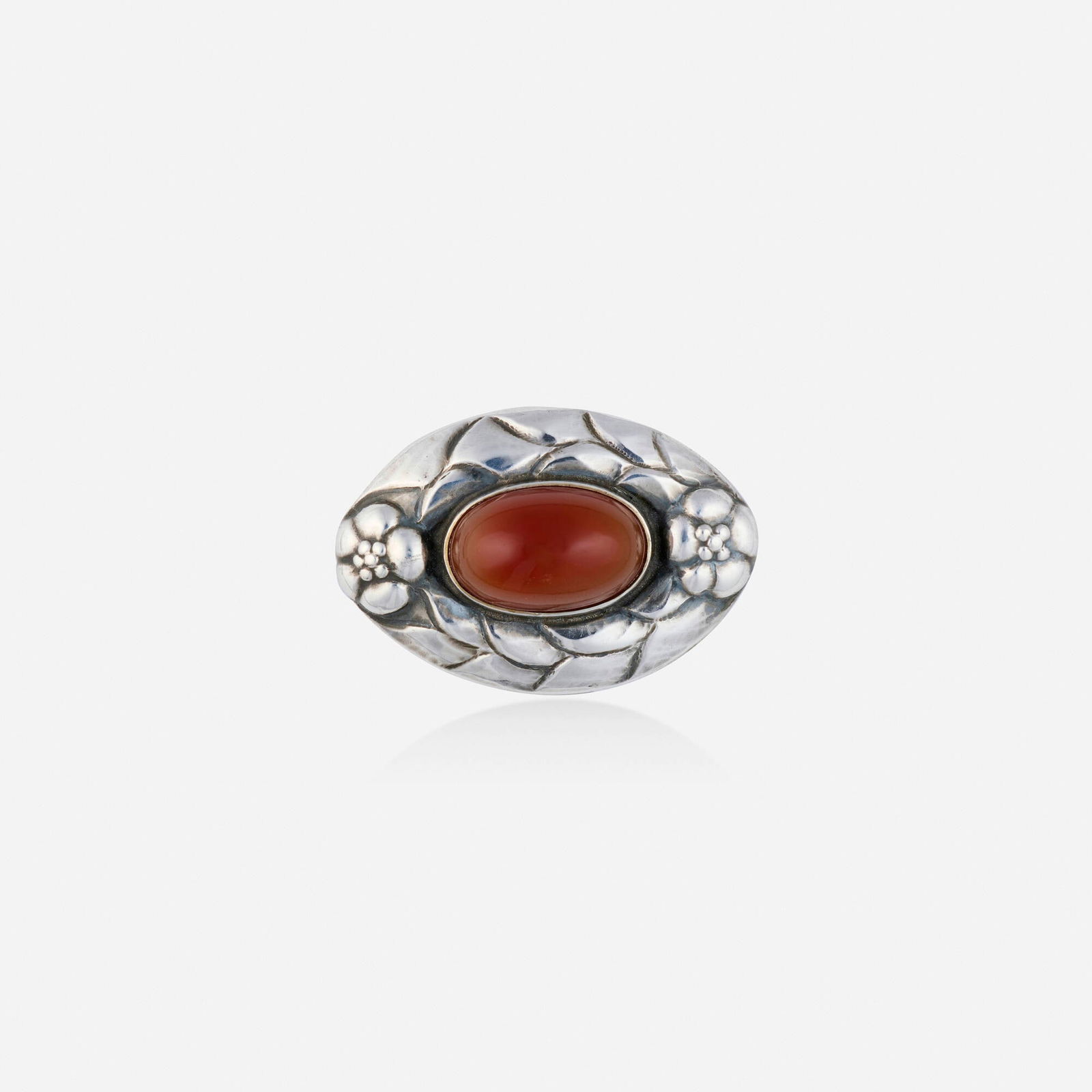 Georg Jensen, Arts & Crafts carnelian and silver brooch: Georg Jensen Arts & Crafts carnelian and silver brooch Lori Ulanova was one of the first female violinists in the Los Angeles Philharmonic Of floral design, set with a cabochon carnelian, no. 51; 1904