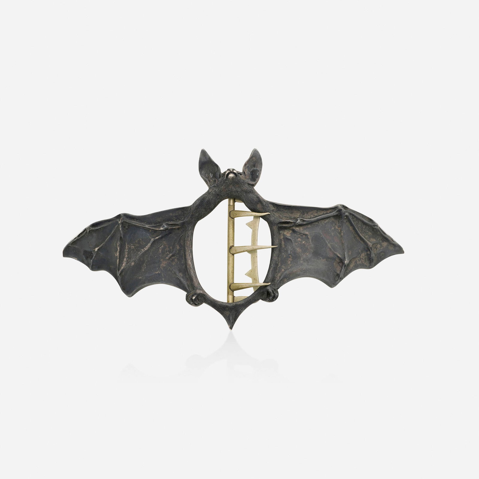 Ferdinand Erhart, Art Nouveau 'Chauve-Souris' belt buckle: Ferdinand Erhart Art Nouveau 'Chauve-Souris' belt buckle Designed as bat with outstretched wings; 1908 Silver Signed with maker's mark for Ferdinand Erhart 5.50 x 2.875 in; Gross weight 39.0 dwts
