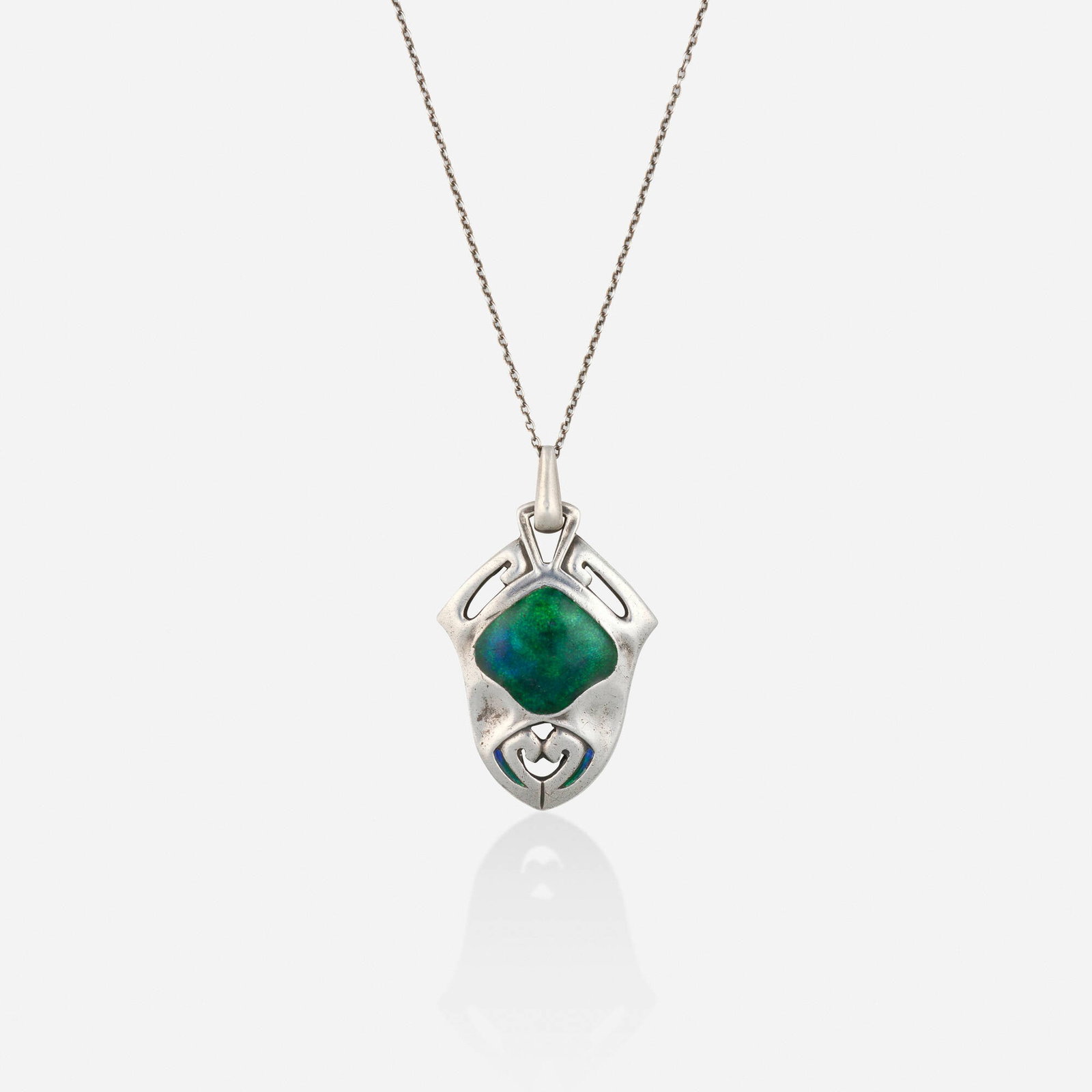 Archibald Knox for Liberty & Co., Arts & Crafts enamel and silver necklace: Archibald Knox for Liberty & Co. Arts & Crafts enamel and silver necklace The open-form pendant of blue and green enamel, suspended from the fine link chain; 1900s Silver Signed with maker's mark for
