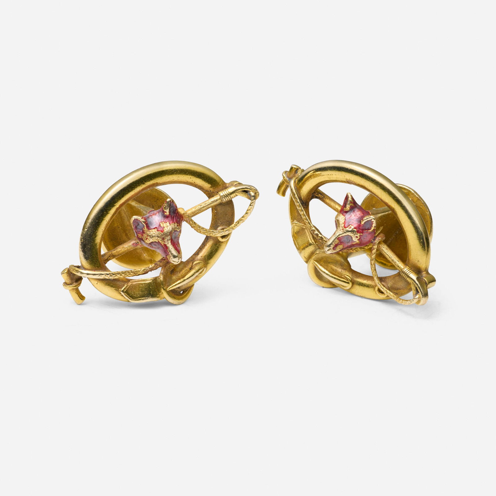 Retro, Enamel and gold cufflinks: Retro Enamel and gold cufflinks Each depicting a buckle, riding crop, and enamel fox head 14k yellow gold 0.75 x 1.125 in; Gross weight 13.7 dwts This work will ship from Lambertville,