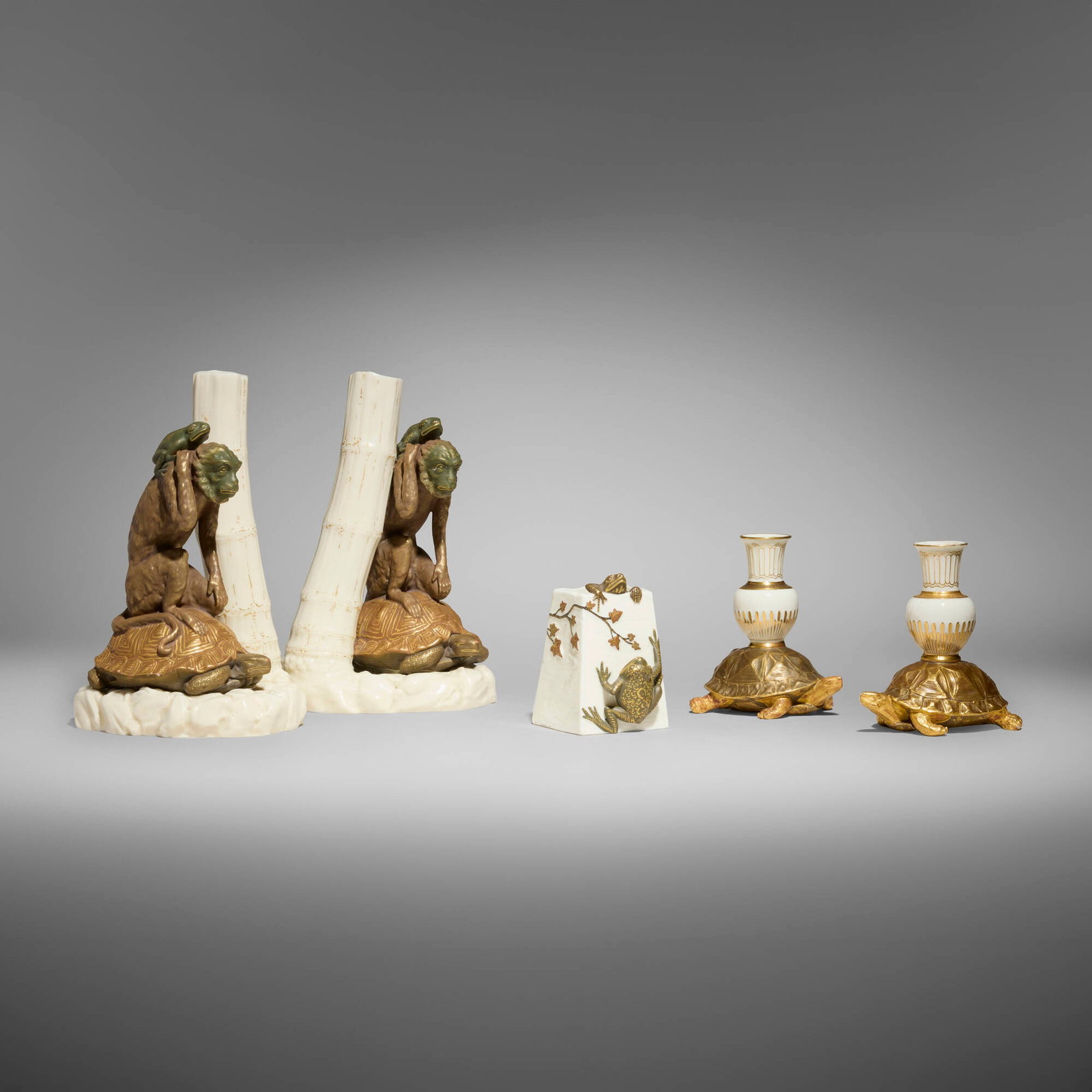 Royal Worcester, Collection of five works: Royal Worcester Collection of five works England, 1876, 1877 glazed and gilt porcelain 9 h x 6 w x 5.75 d in (23 x 15 x 15 cm) 4.5 h x 4.25 w x 3.25 d in (11 x 11 x 8 cm) 4 h x 2.5 w x 3.25 d in