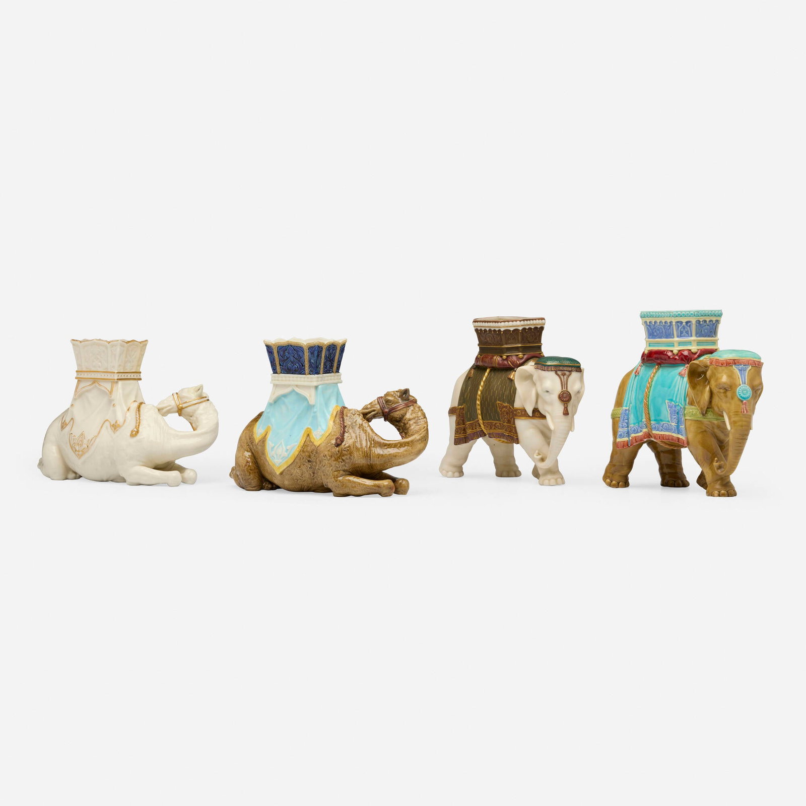 Royal Worcester, Collection of four flower vases: Royal Worcester Collection of four flower vases England, c. 1880 glazed and gilt porcelain tallest: 8 h x 9.125 w x 3.875 d in (20 x 23 x 10 cm) shortest: 6.875 h x 10.25 w x 5 d in (17 x 26 x 13 c