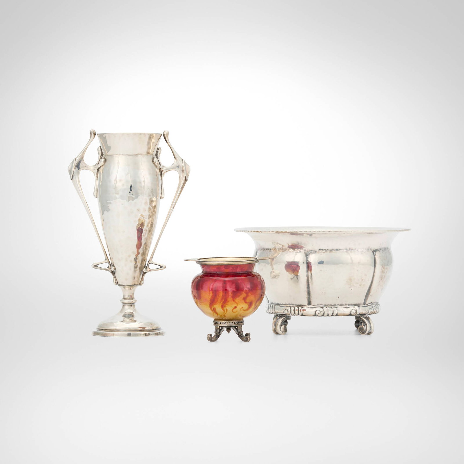 Collection of table accessories: Collection of table accessories early 20th century silver, enameled metal 7.5 h x 4.5 w x 2.75 d in (19 x 11 x 7 cm) 3.75 h x 6.5 dia in (10 x 17 cm) 2.75 h x 3 w x 2.5 d in (7 x 8 x 6 cm) Collection 