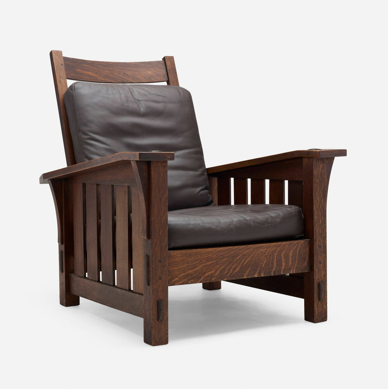 Gustav Stickley, Bent-arm Morris chair, model 369: Gustav Stickley Bent-arm Morris chair, model 369 USA, c. 1910 oak, leather 38.5 h x 33 w x 37.5 d in (98 x 84 x 95 cm) Red manufacturer's decal to inside back rail 'Als ik kan Gustav