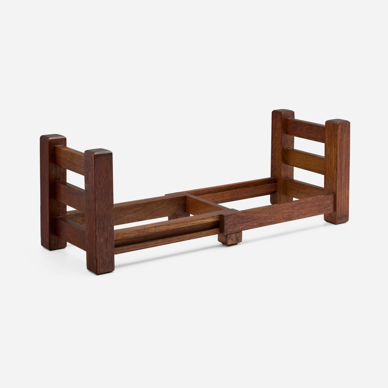 Gustav Stickley, Adjustable book rack: Gustav Stickley Adjustable book rack USA, c. 1904-07 oak 7 h x 12 w x 7 d in (18 x 30 x 18 cm) Red manufacturer's decal to leg 'Als ik kan Gustav Stickley' with joiner's com