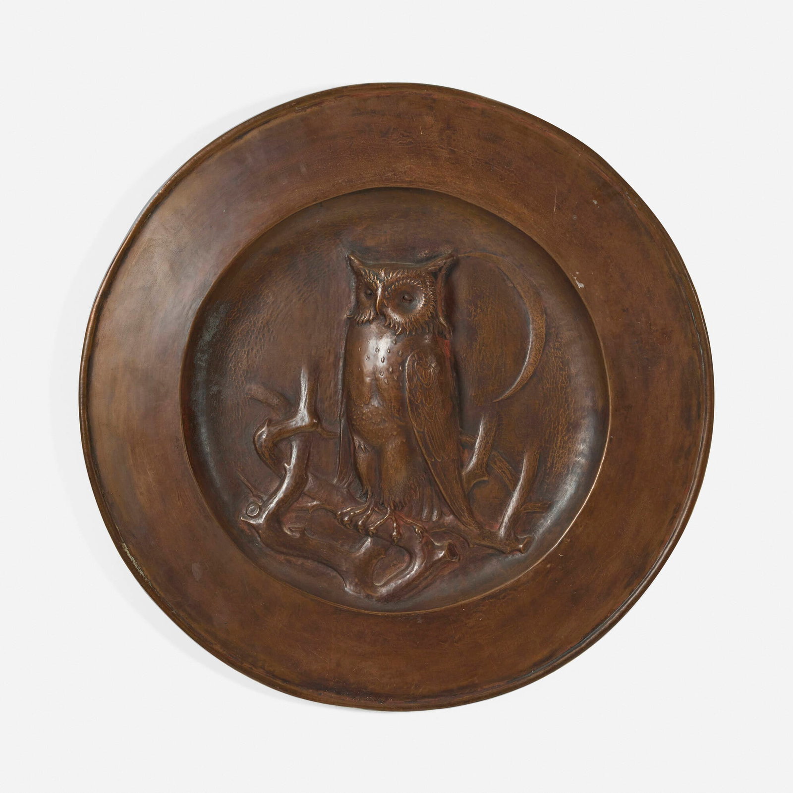 Liberty & Co., Large plaque with owl and crescent moon: Liberty & Co. Large plaque with owl and crescent moon United Kingdom, c. 1925 handwrought copper 1 h x 29.5 dia in (3 x 75 cm) Paper manufacturer's label to reverse 'Liberty'.