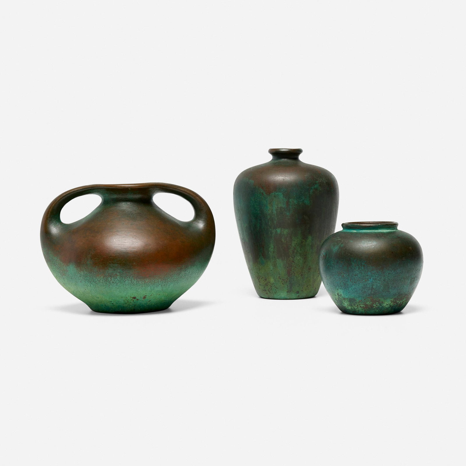 Charles Walter Clewell, Collection of three vases: Charles Walter Clewell Collection of three vases USA, c. 1930 copper-clad earthenware 7 h x 4.5 dia in (18 x 11 cm) 5.5 h x 7 w x 6 d in (14 x 18 x 15 cm) 3.5 h x 4.25 dia in (9 x 11 cm) Incised