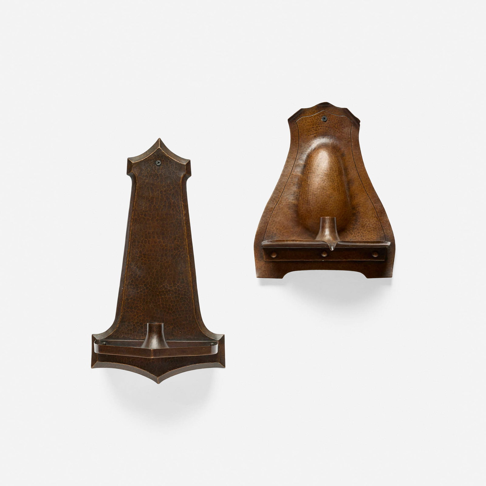 Arts & Crafts, Candle sconces, set of two: Arts & Crafts Candle sconces, set of two early 20th century handwrought copper 15 h x 8.5 w x 7.5 d in (38 x 22 x 19 cm) 11 h x 9 w x 5 d in (28 x 23 x 13 cm) Provenance: Collection of Stuart