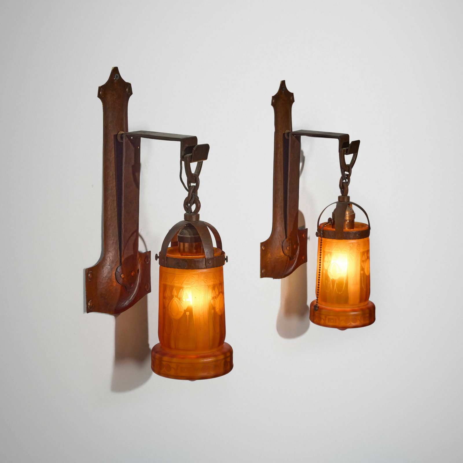 Handel, Sconces with stylized flowers and trees, pair: Handel Sconces with stylized flowers and trees, pair USA, c. 1920 etched glass, handwrought copper 16 h x 6 w x 6 d in (41 x 15 x 15 cm) Provenance: Collection of Stuart Solomo