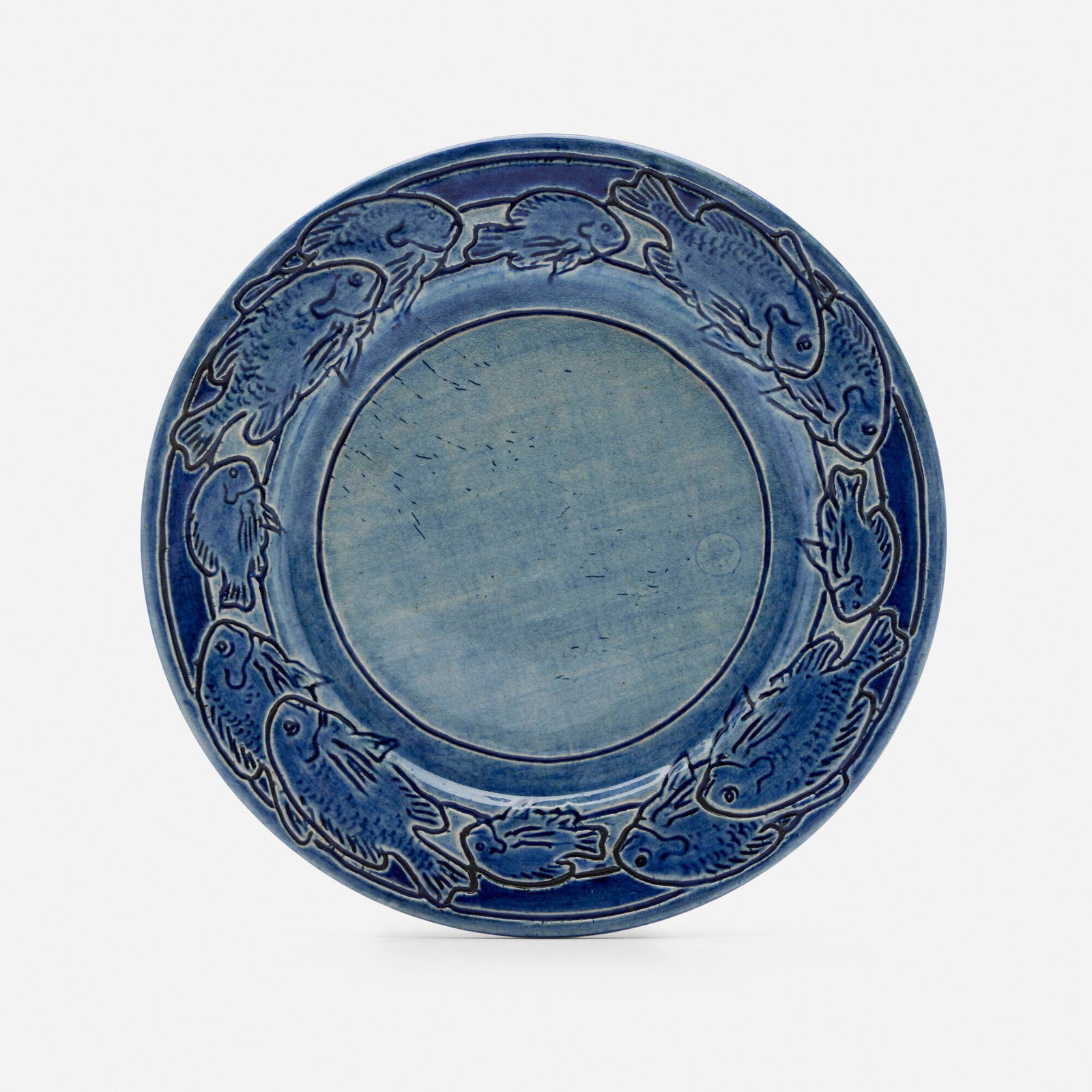 Mary Frances Baker for Newcomb College Pottery, Early plate with a school of fish: Mary Frances Baker for Newcomb College Pottery Early plate with a school of fish USA, 1906 glazed earthenware 1.25 h x 9.5 dia in (3 x 24 cm) Impressed and glazed manufacturer's mark and date